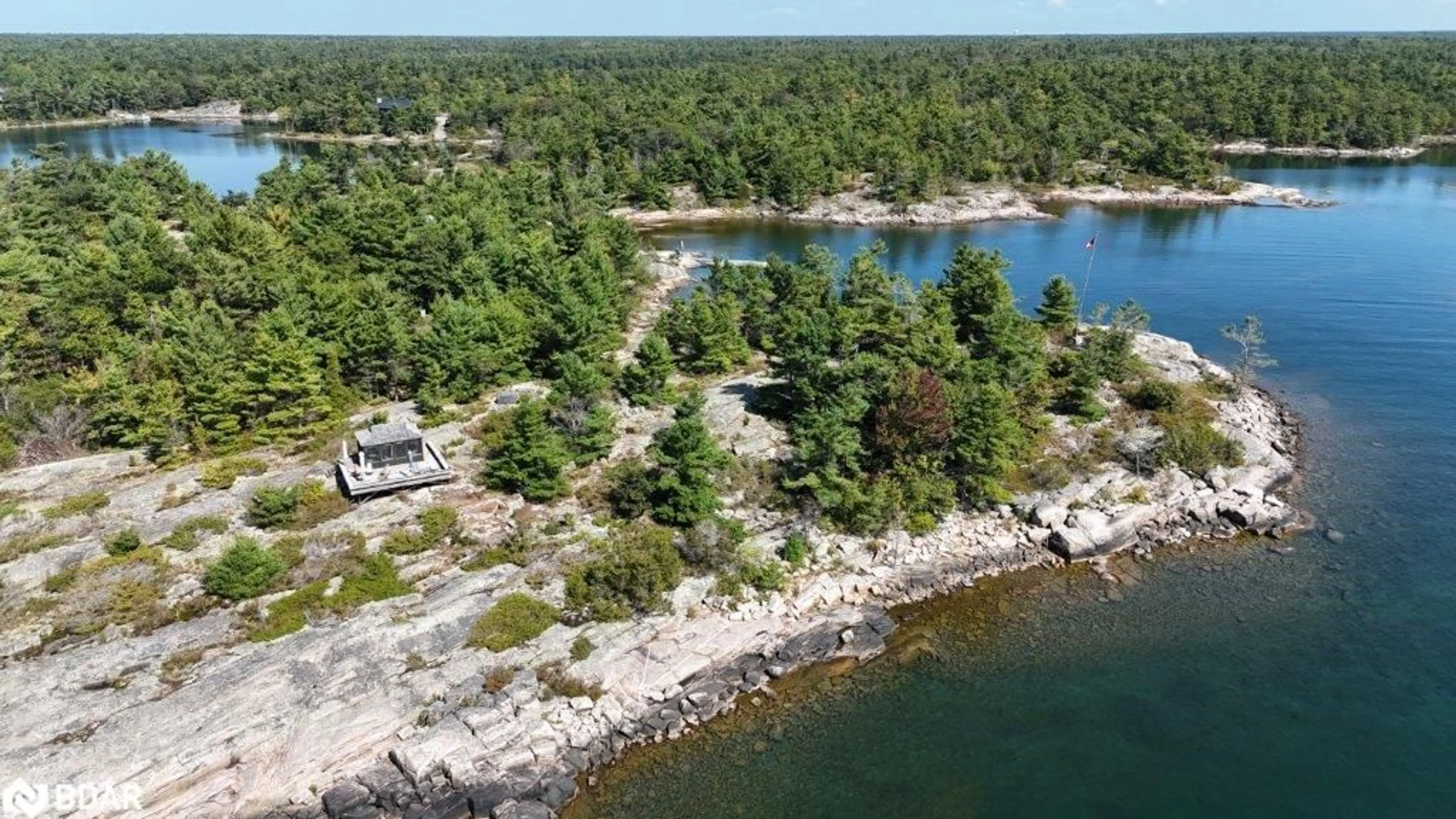 A pic from outside/outdoor area/front of a property/back of a property/a pic from drone, water/lake/river/ocean view for 2 Is 4170 Georgian Bay, Georgian Bay Ontario L0X 1S0