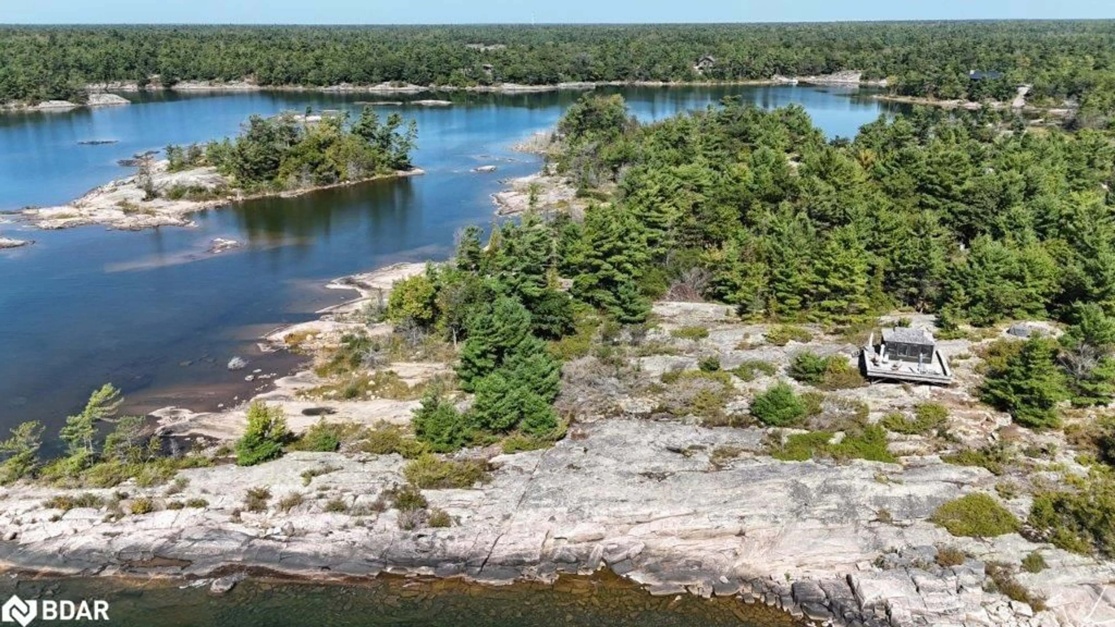 A pic from outside/outdoor area/front of a property/back of a property/a pic from drone, water/lake/river/ocean view for 2 Is 4170 Georgian Bay, Georgian Bay Ontario L0X 1S0