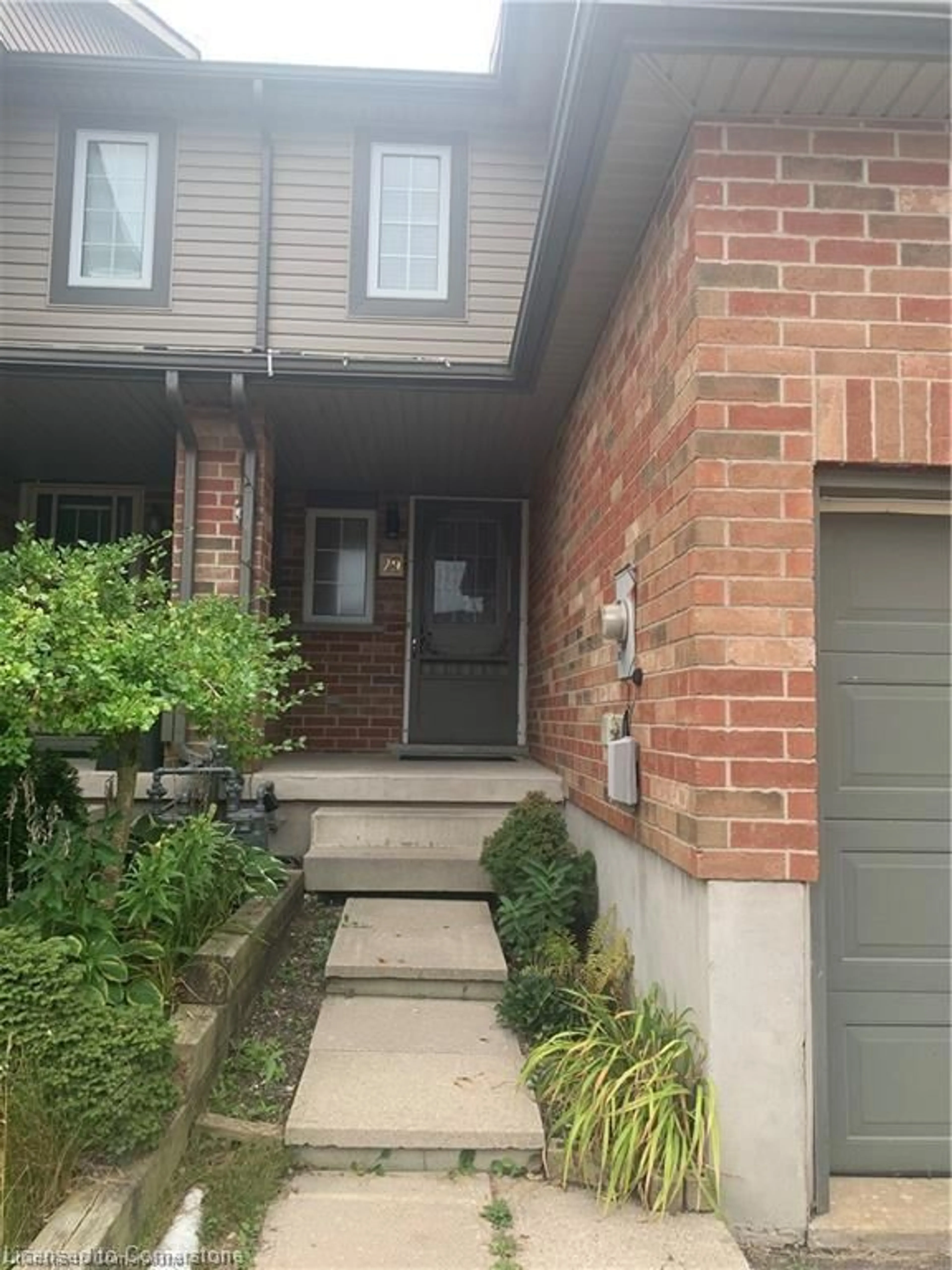 Home with brick exterior material, street for 29 Max Becker St, Kitchener Ontario N2E 3V7