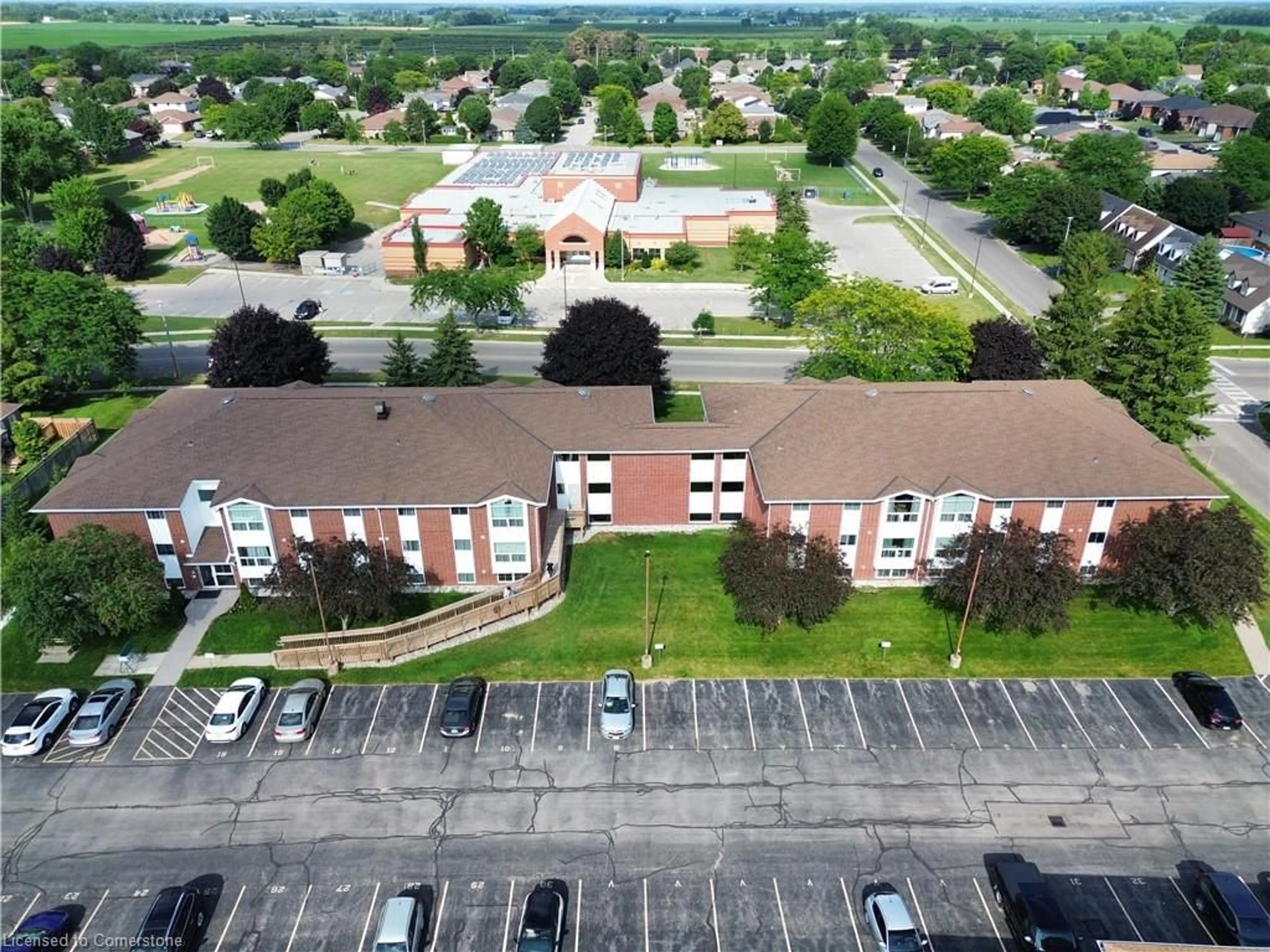 A pic from outside/outdoor area/front of a property/back of a property/a pic from drone, building for 60 Donly Dr #310, Simcoe Ontario N3Y 5K3