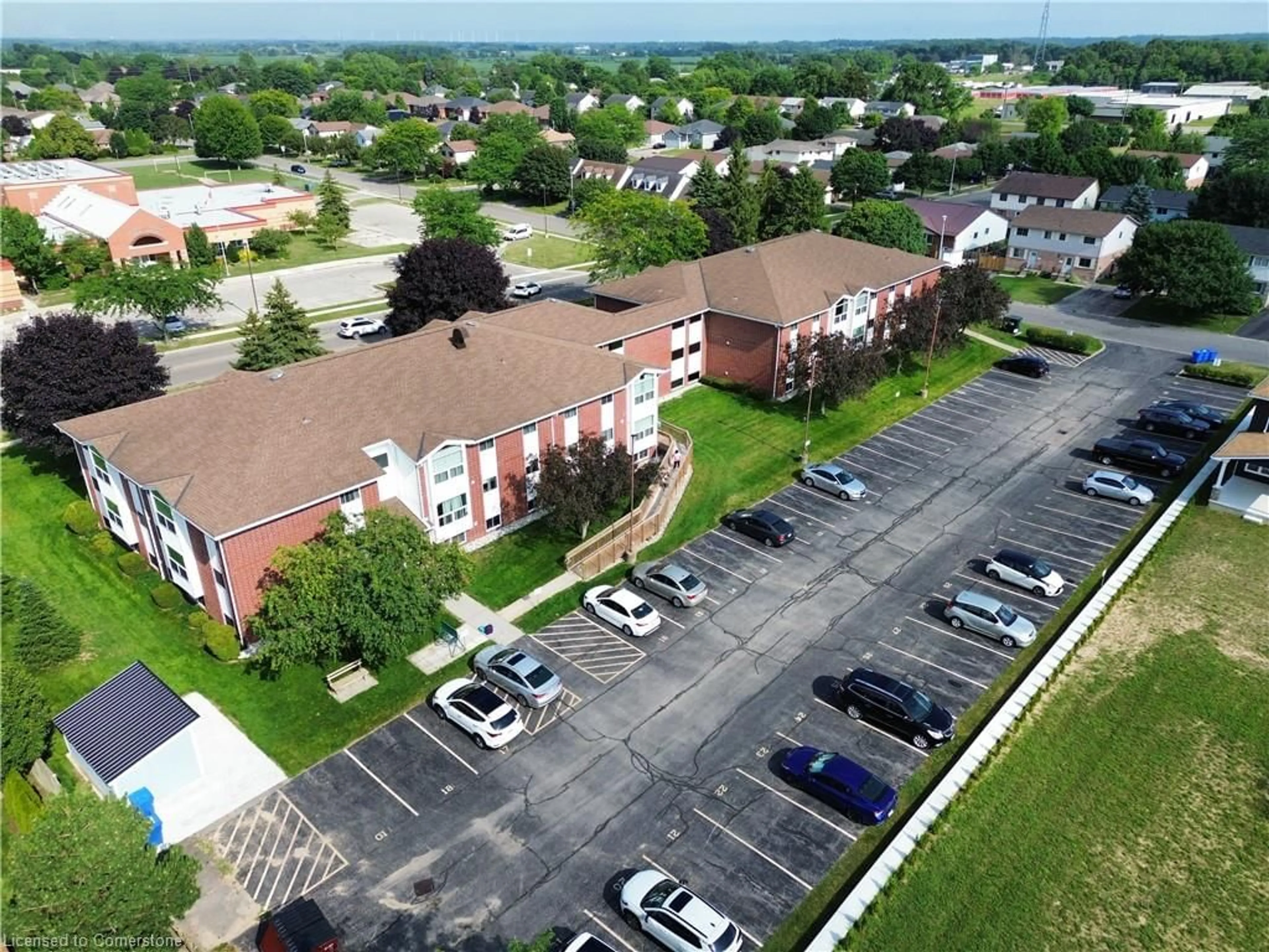 A pic from outside/outdoor area/front of a property/back of a property/a pic from drone, building for 60 Donly Dr #310, Simcoe Ontario N3Y 5K3