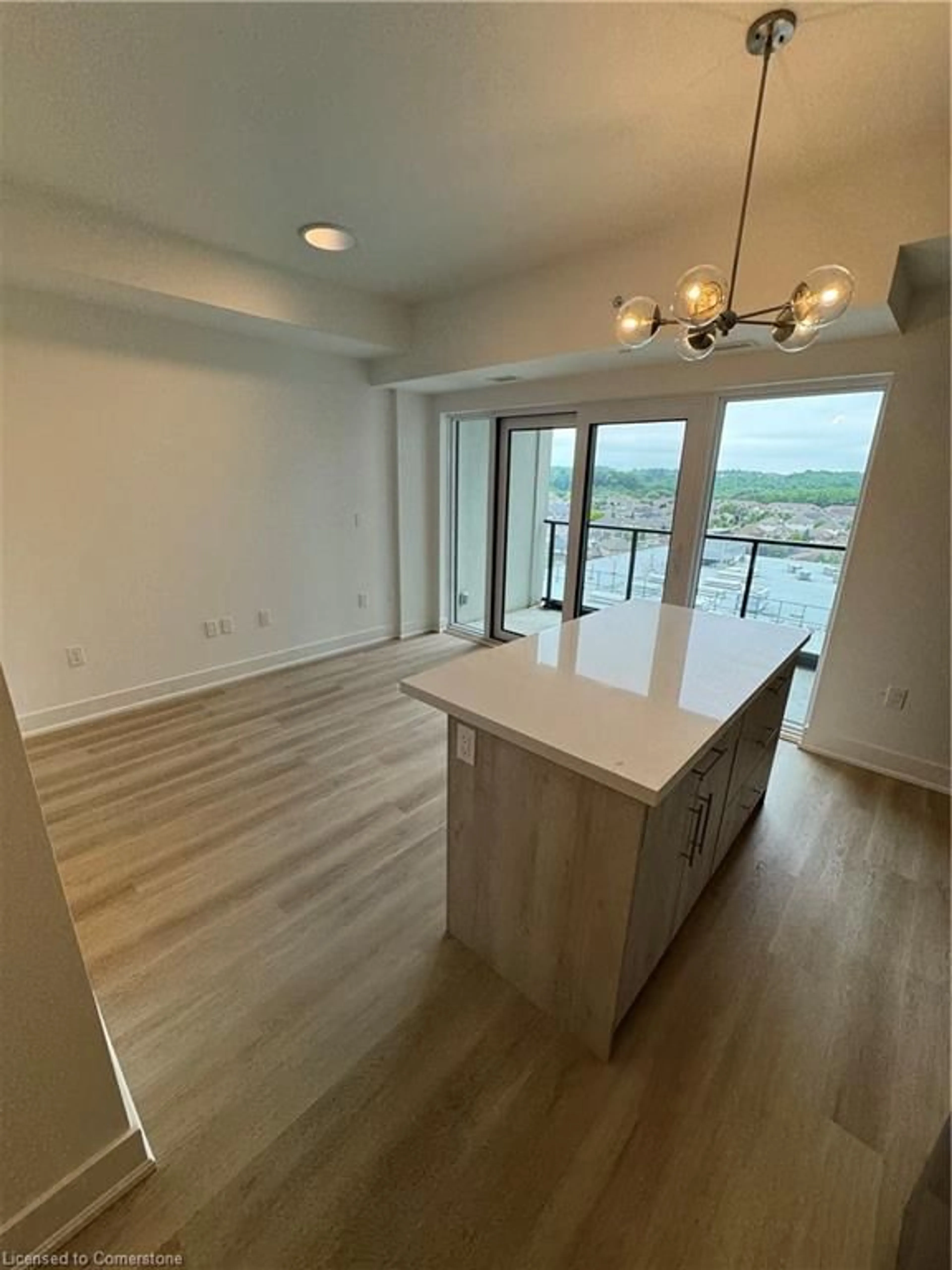 Open concept kitchen, wood/laminate floor for 575 Conklin Rd #811, Brantford Ontario N3T 0B9