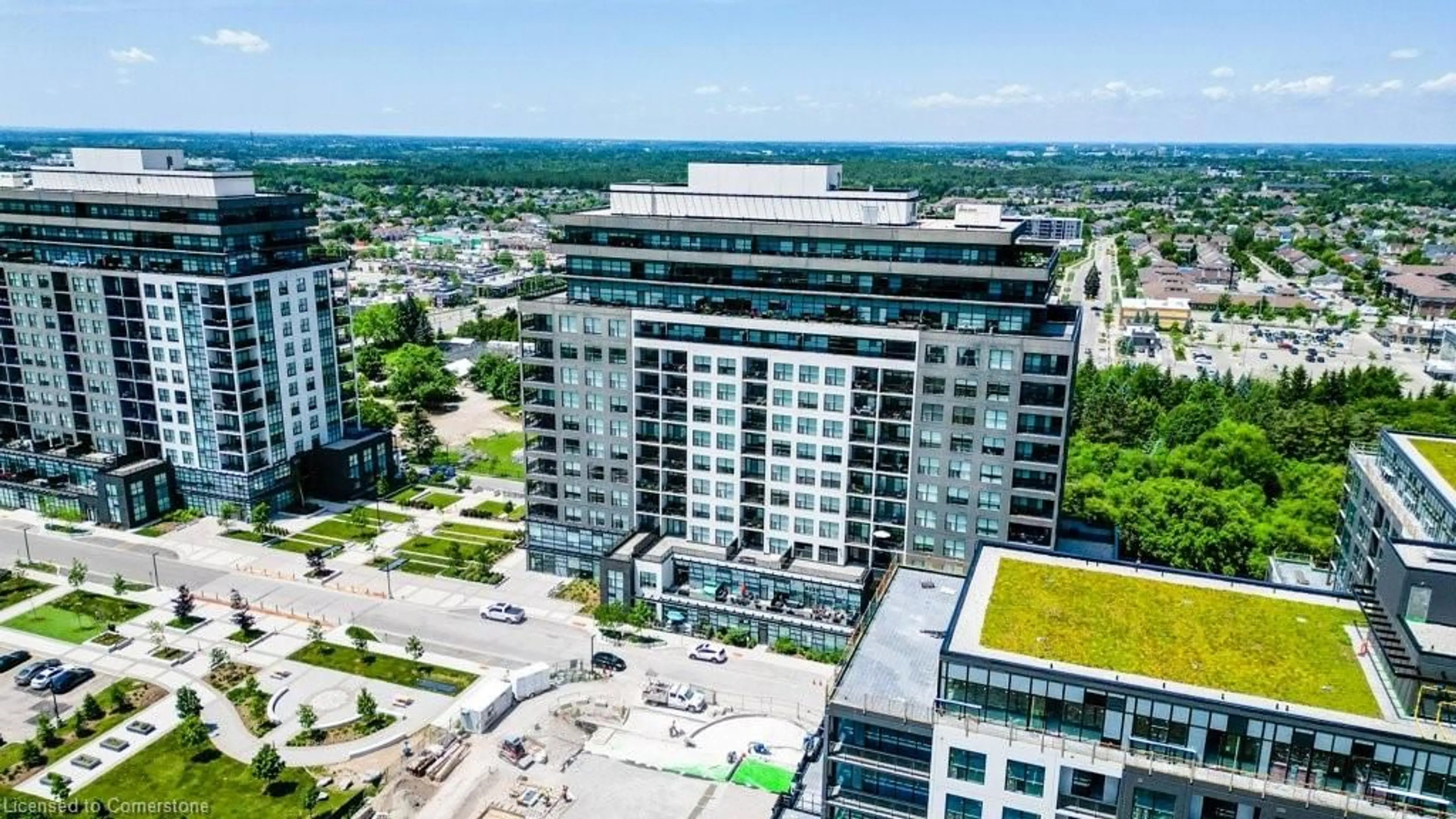 A pic from outside/outdoor area/front of a property/back of a property/a pic from drone, city buildings view from balcony for 1880 Gordon St #109, Guelph Ontario N1L 0P5