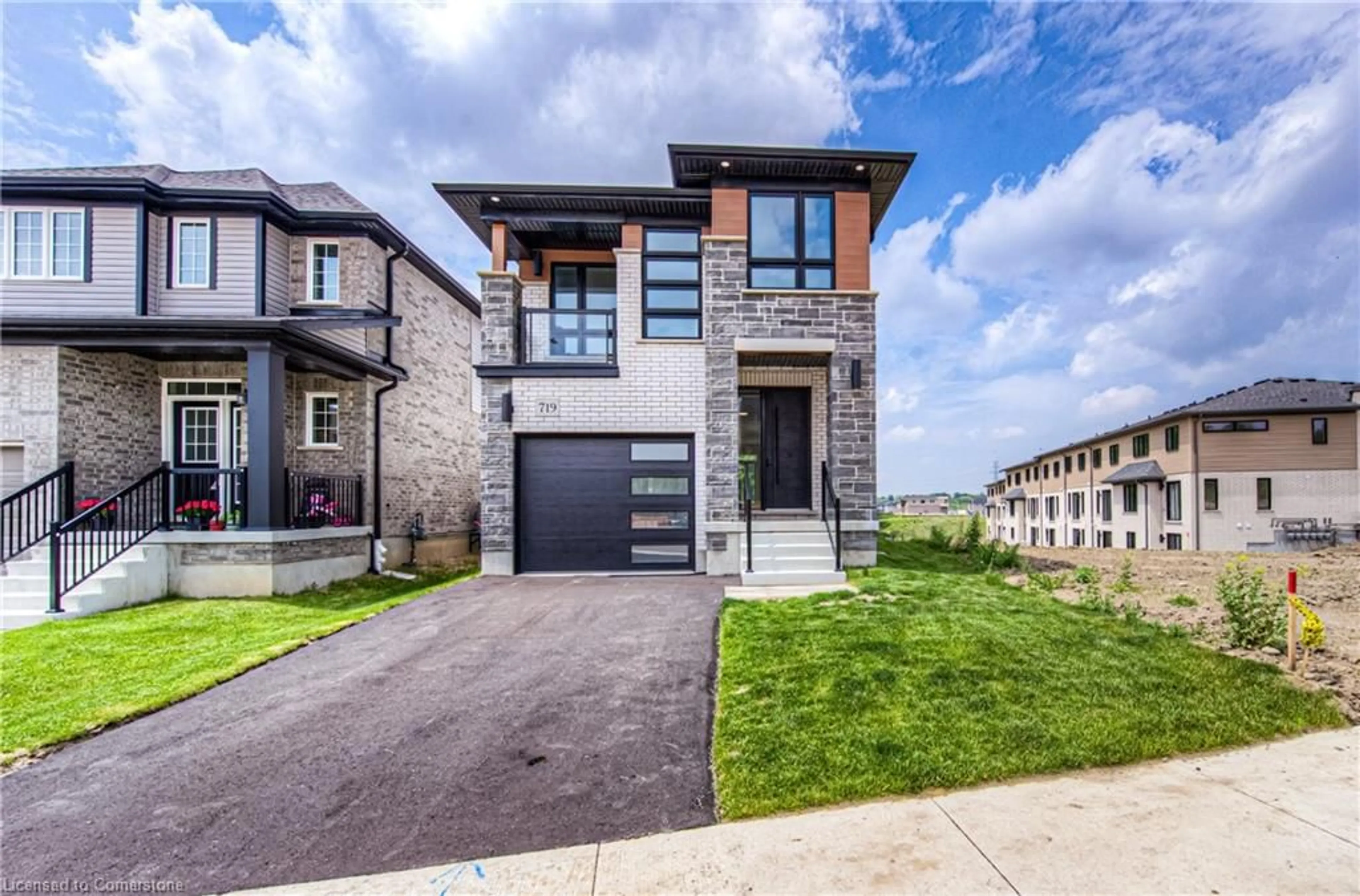 Home with brick exterior material, street for 719 Benninger Dr, Kitchener Ontario N2E 0J2