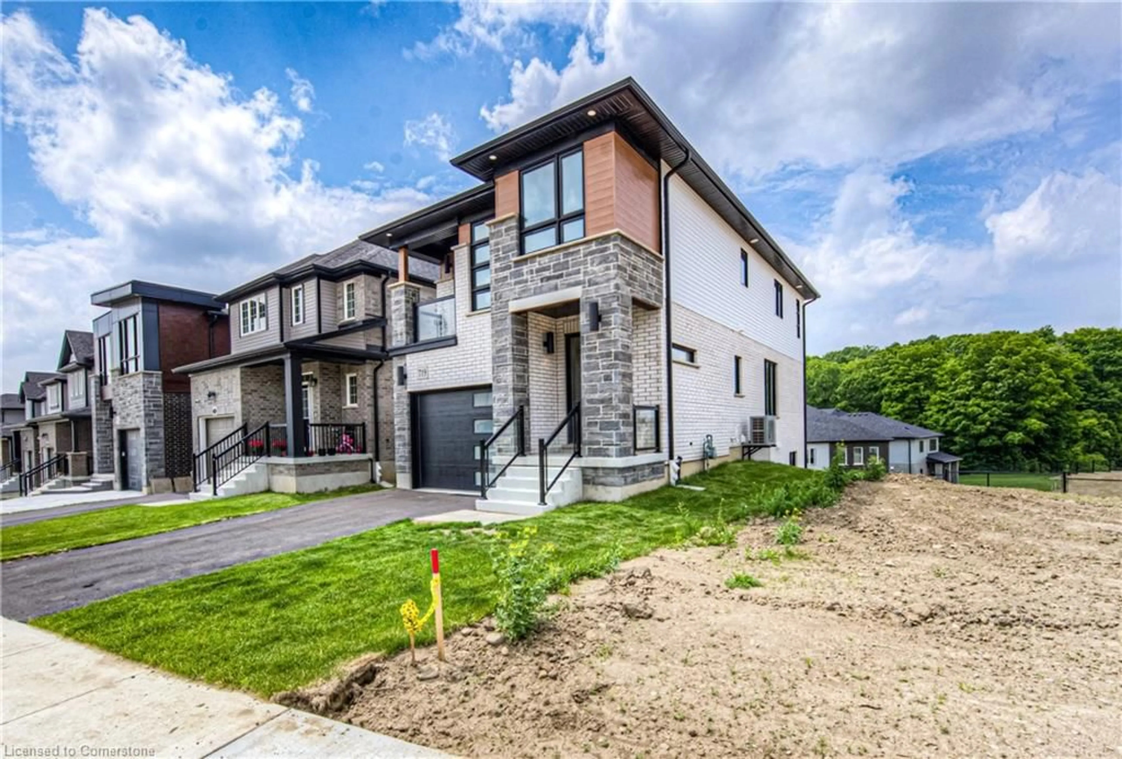 Home with brick exterior material, street for 719 Benninger Dr, Kitchener Ontario N2E 0J2