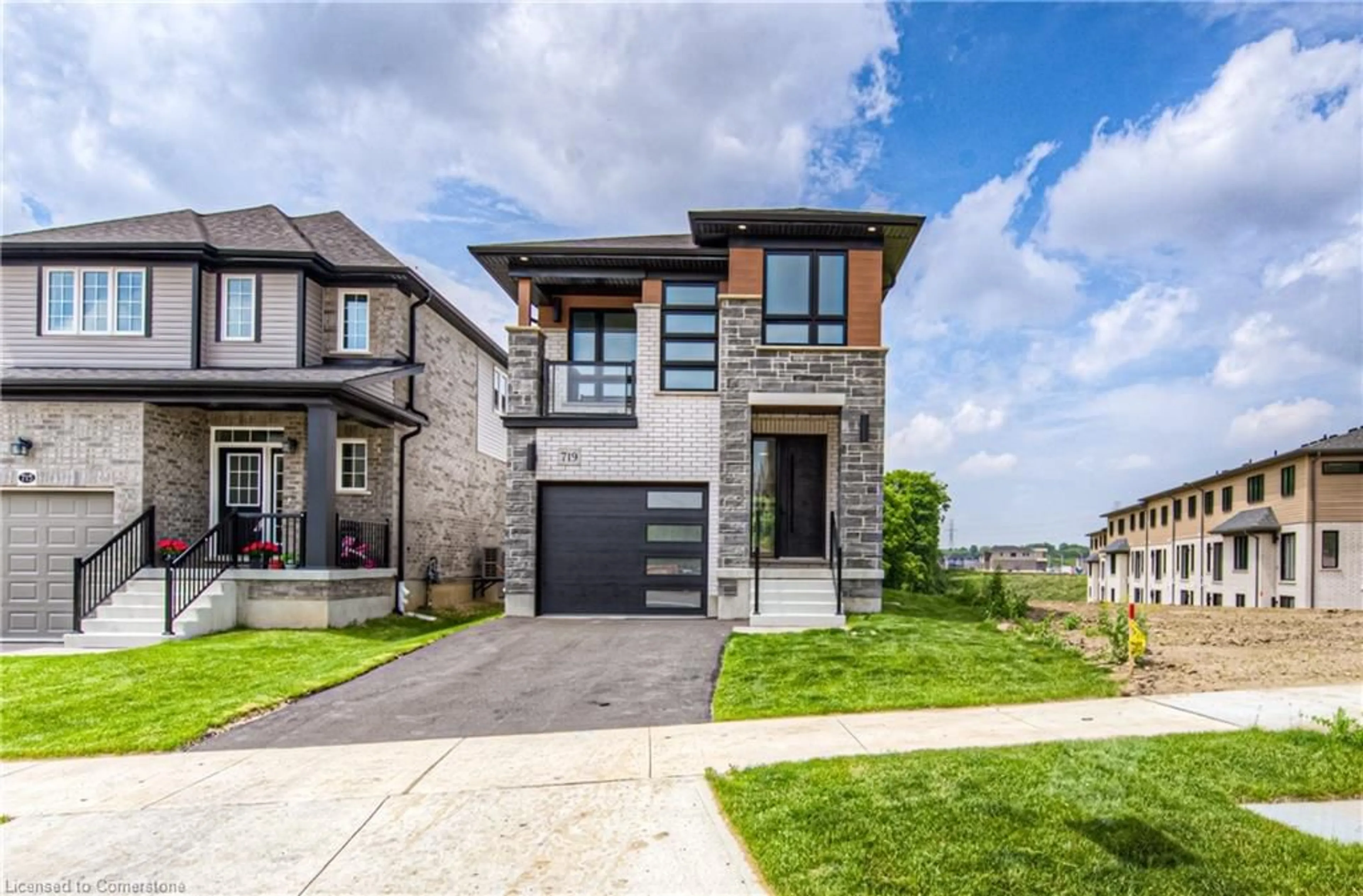 Home with brick exterior material, street for 719 Benninger Dr, Kitchener Ontario N2E 0J2