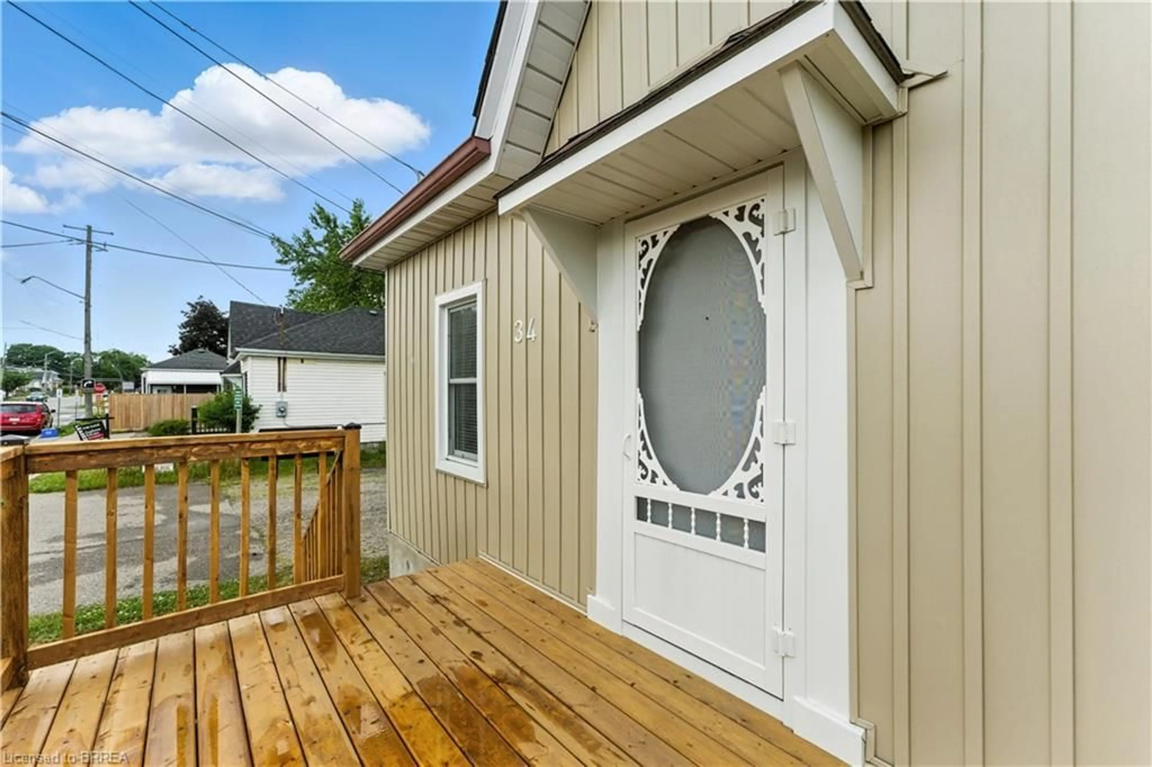 Home with vinyl exterior material, street for 34 North Park St, Brantford Ontario N3R 4J6