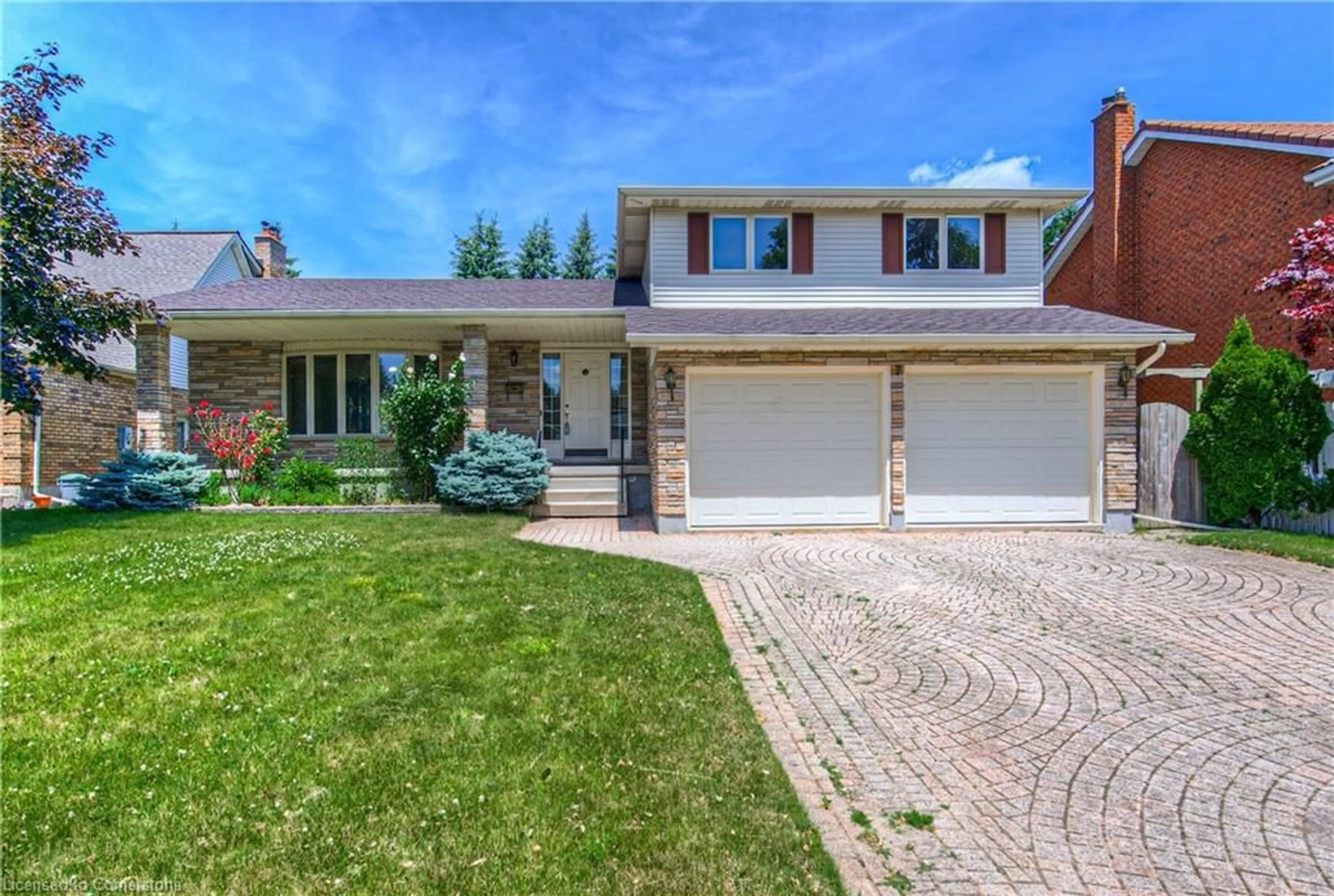 Home with brick exterior material, street for 7 Dunnington Crt, Kitchener Ontario N2A 3M5