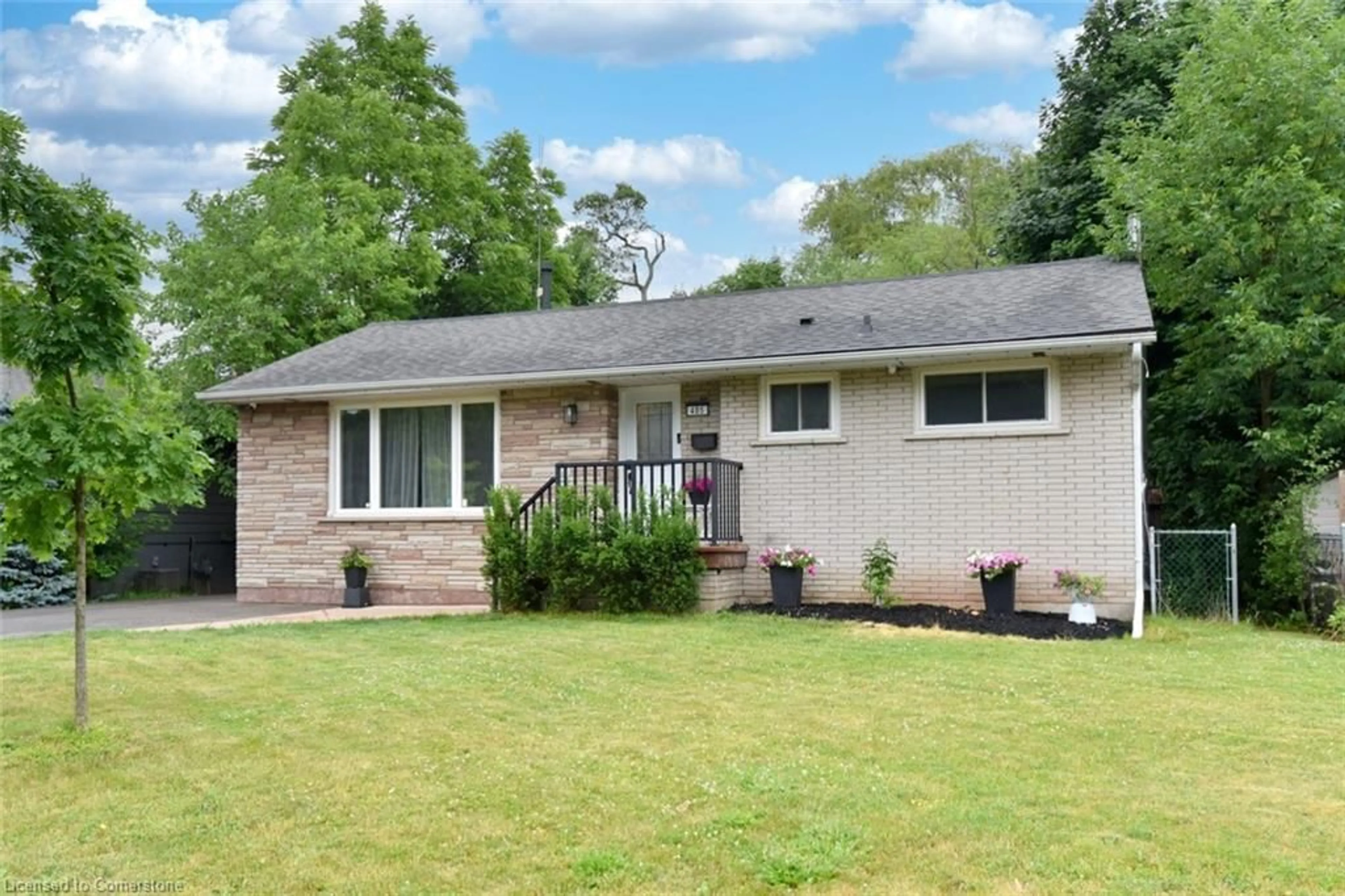 Home with brick exterior material, street for 405 Erindale Dr, Burlington Ontario L7L 4T3