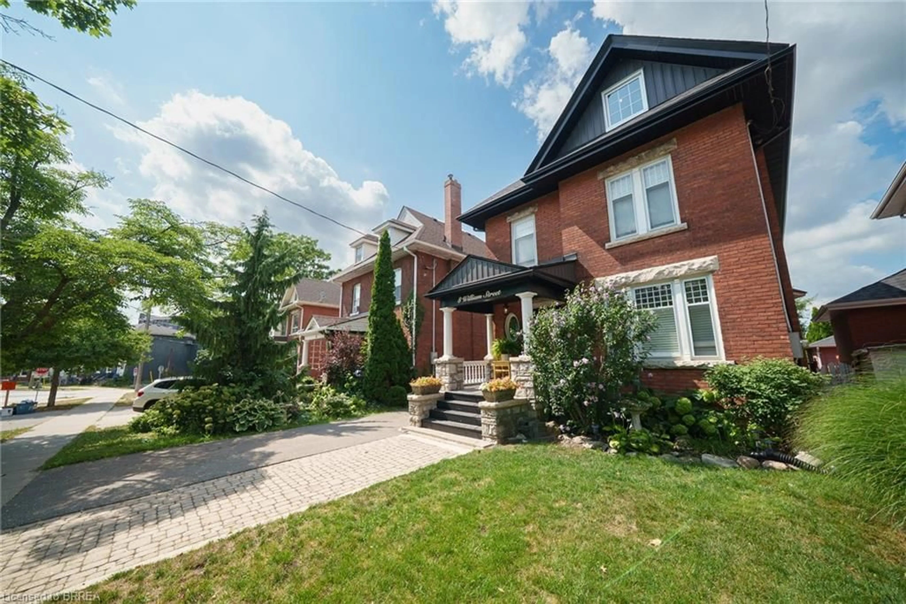 Home with brick exterior material, street for 8 William St, Brantford Ontario N3T 3K1
