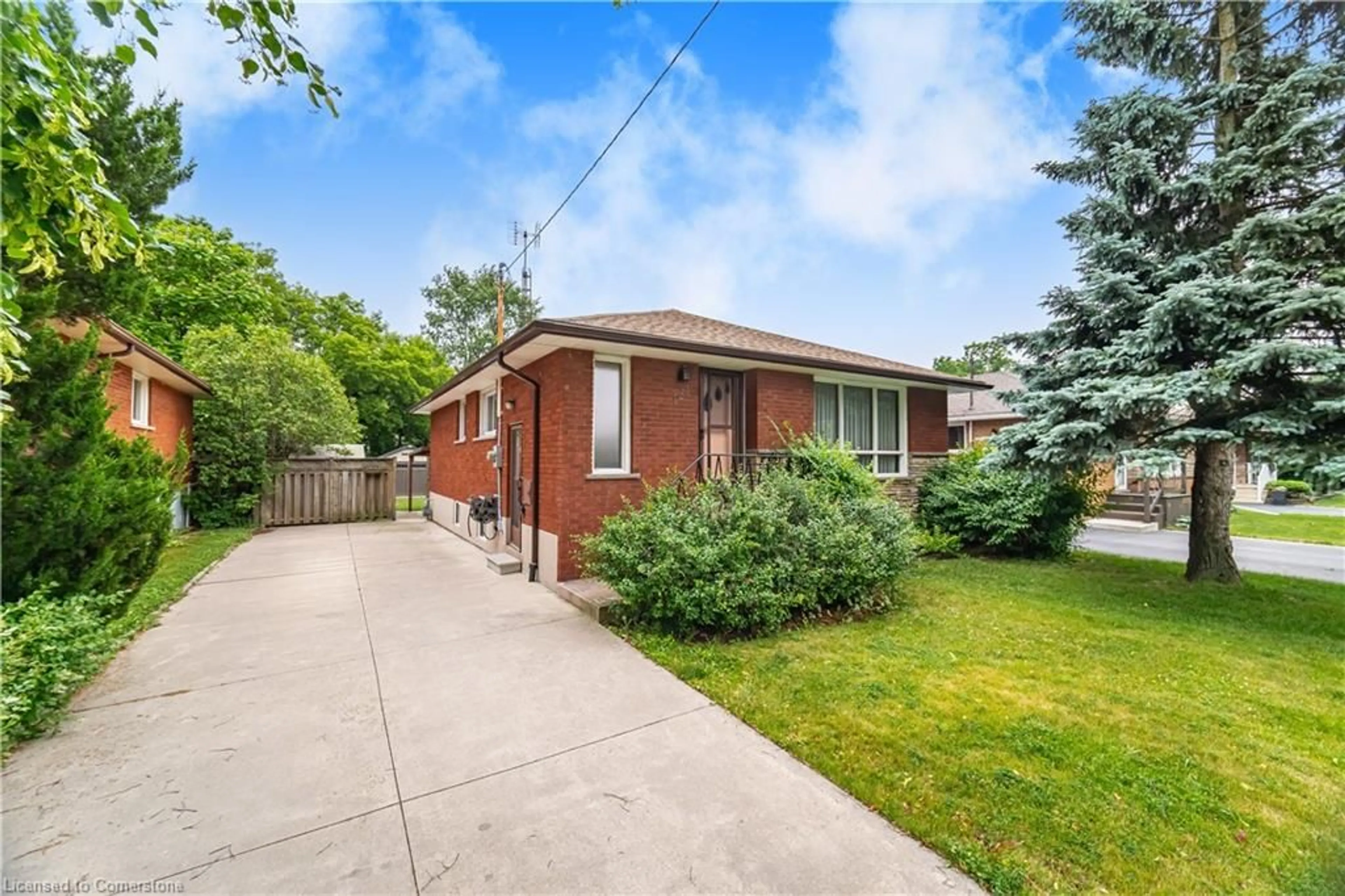 Home with brick exterior material, street for 121 Manning Ave, Hamilton Ontario L9A 3E8