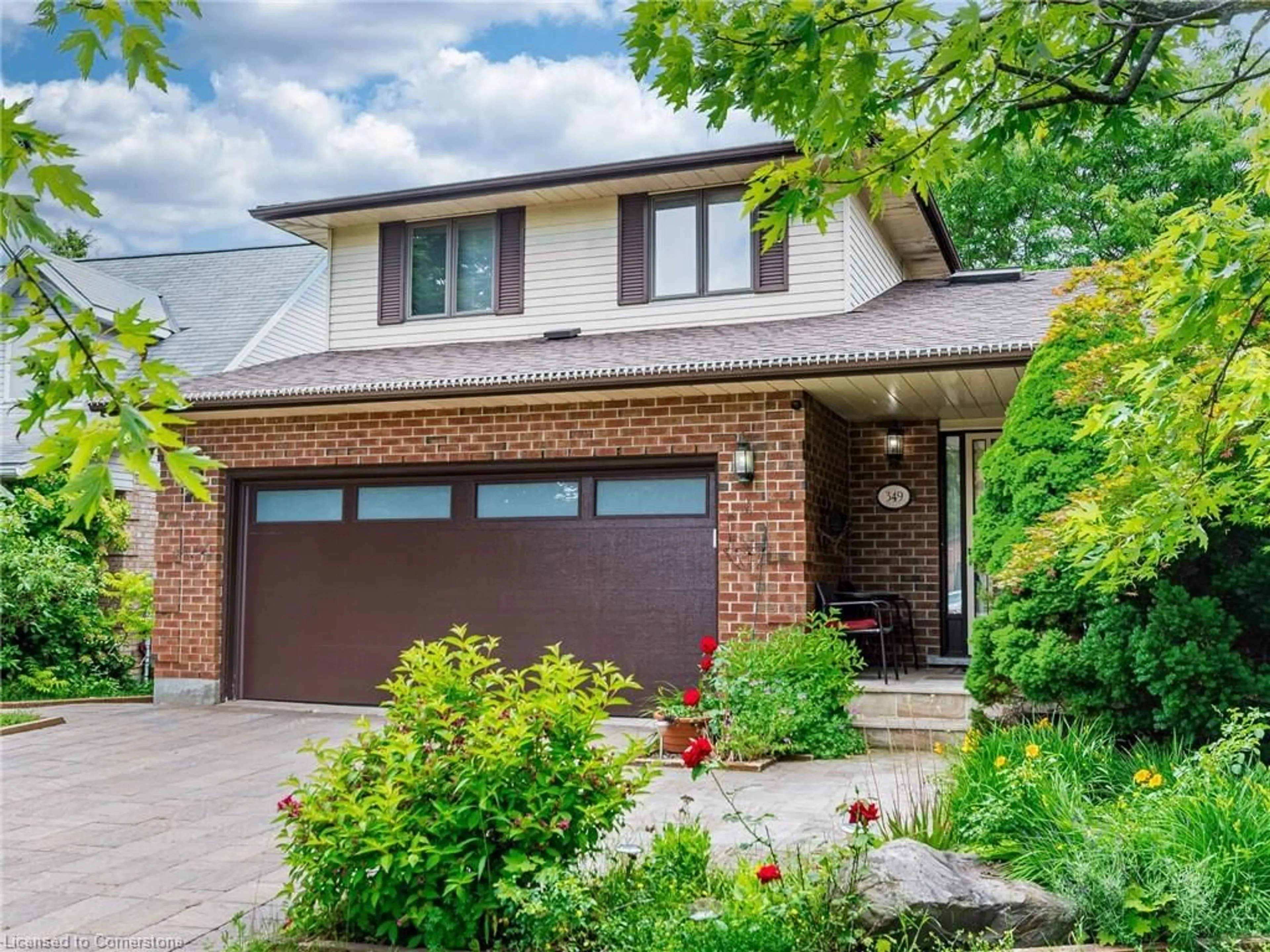 Home with brick exterior material, street for 349 Ironwood Rd Rd, Guelph Ontario N1G 3P2
