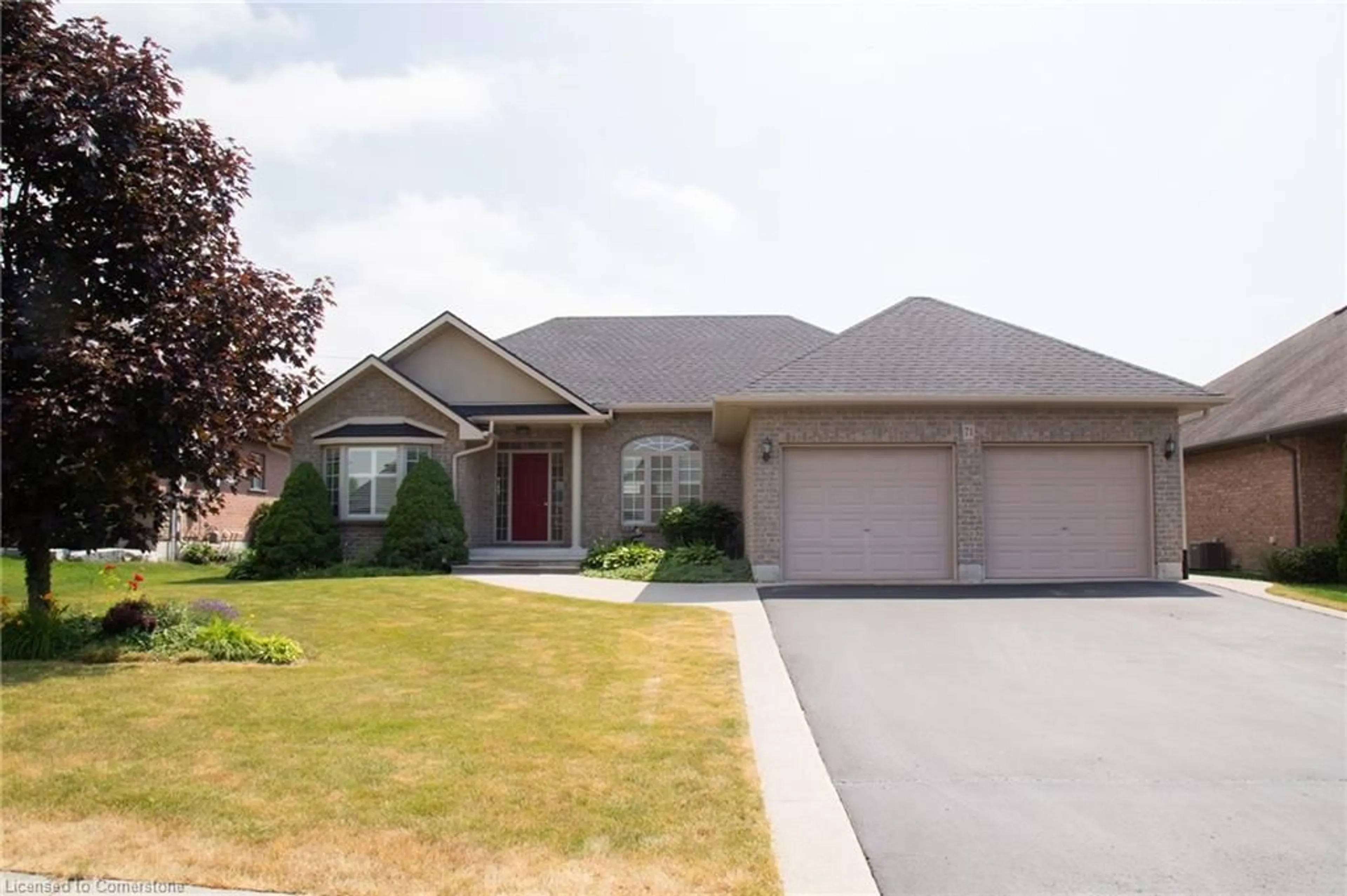 Home with vinyl exterior material, street for 71 Golden Meadow Drive Dr, Port Dover Ontario N0A 1N3