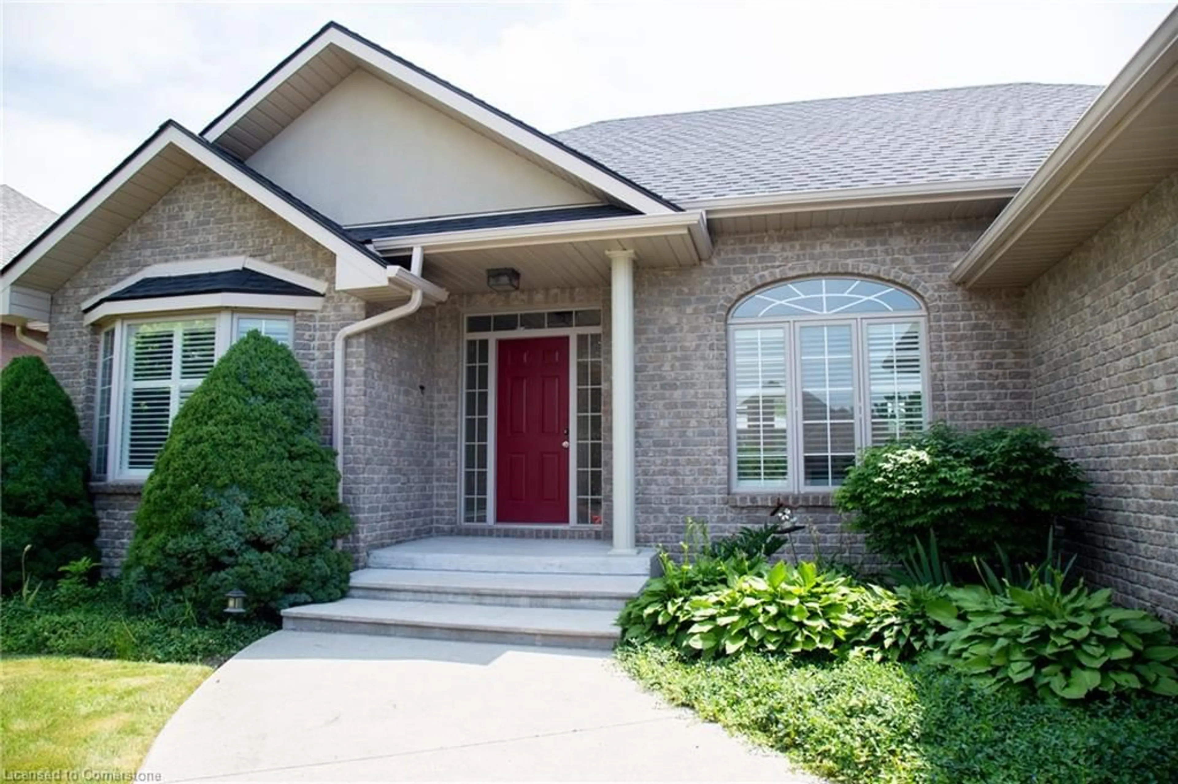 Home with brick exterior material, street for 71 Golden Meadow Drive Dr, Port Dover Ontario N0A 1N3