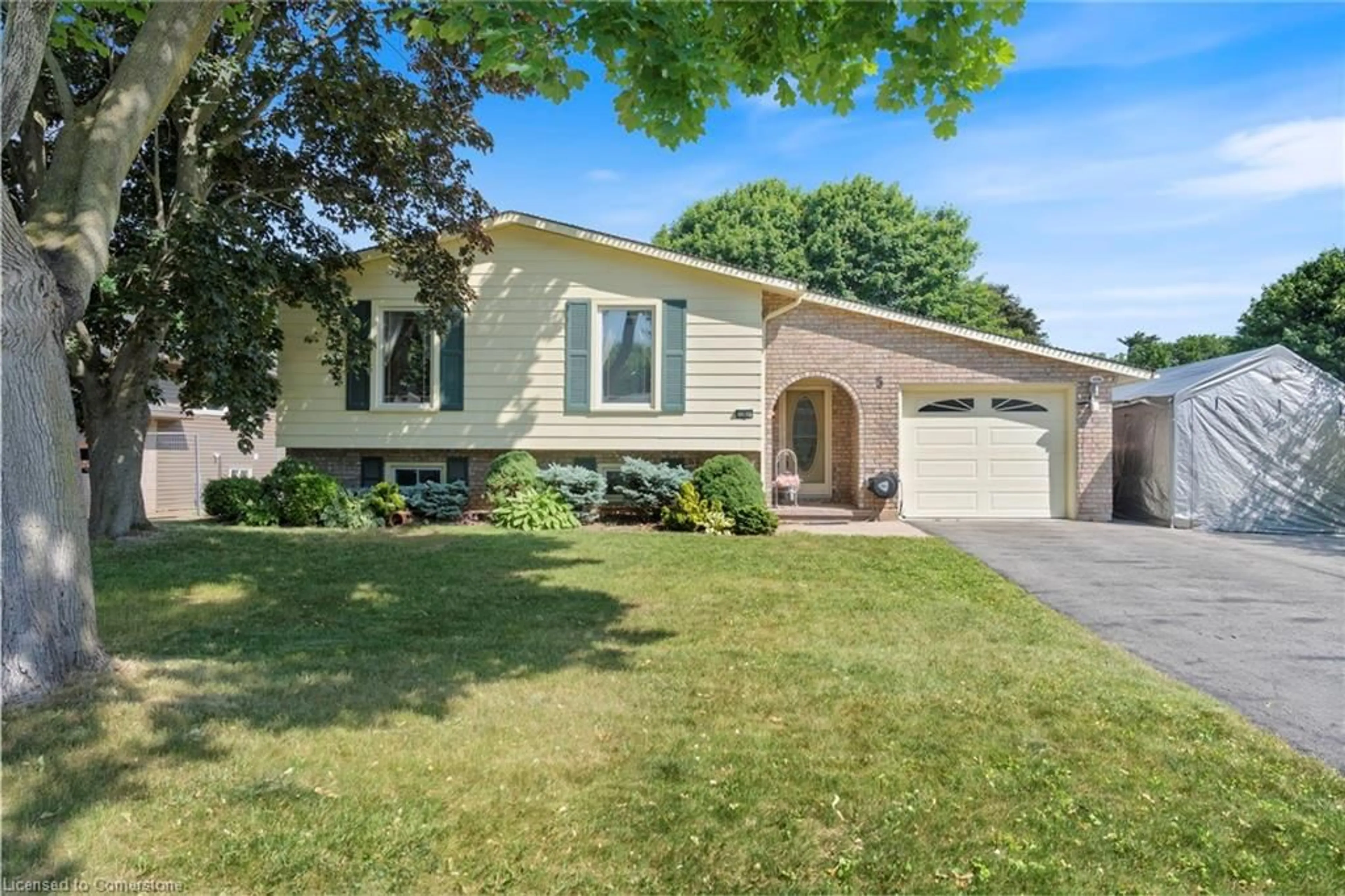 Home with vinyl exterior material, street for 5 Adams Lane, Norfolk Ontario M3Y 4P4