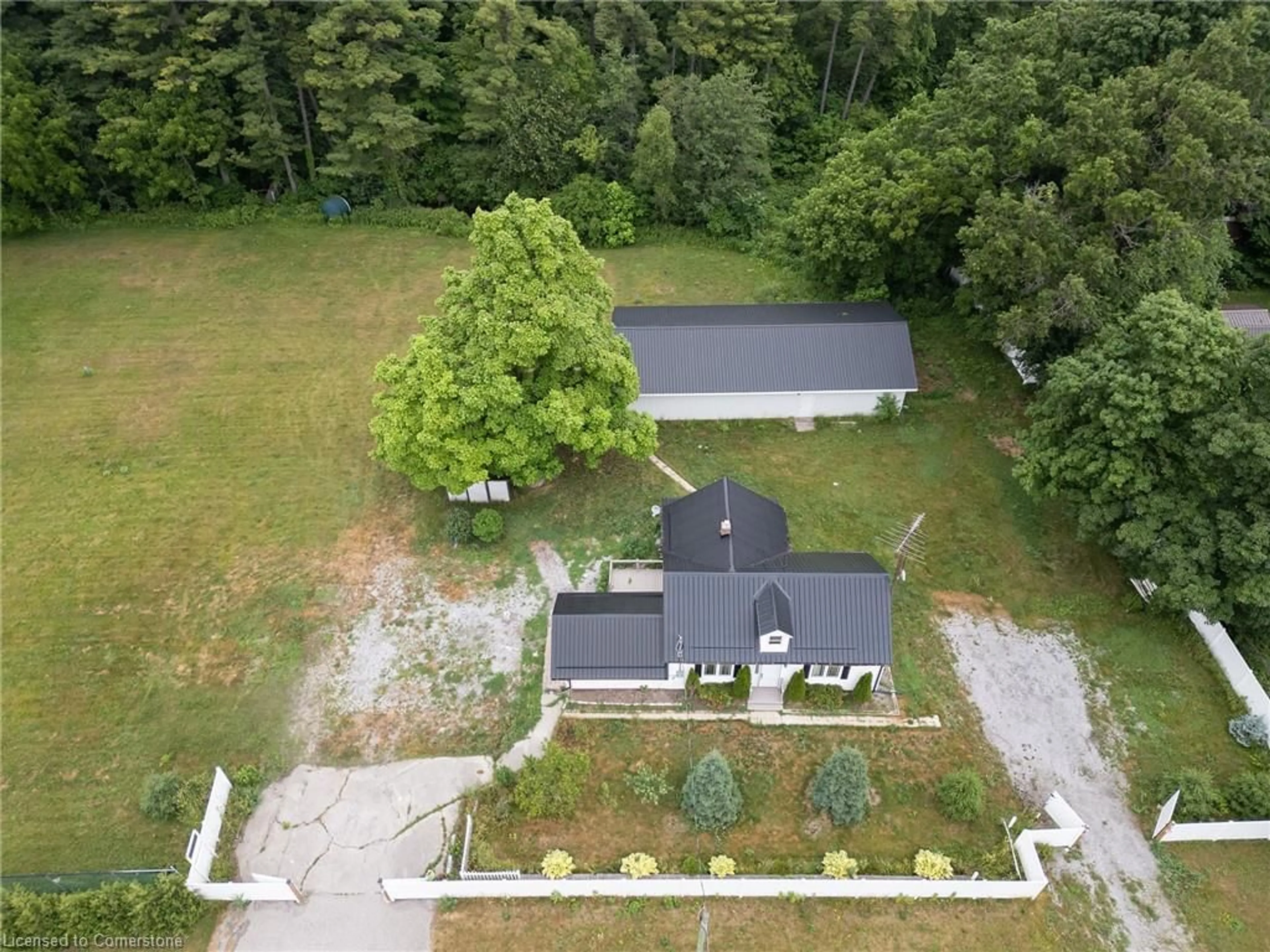 A pic from outside/outdoor area/front of a property/back of a property/a pic from drone, unknown for 3111 Highway 3, Simcoe Ontario N3Y 4J9