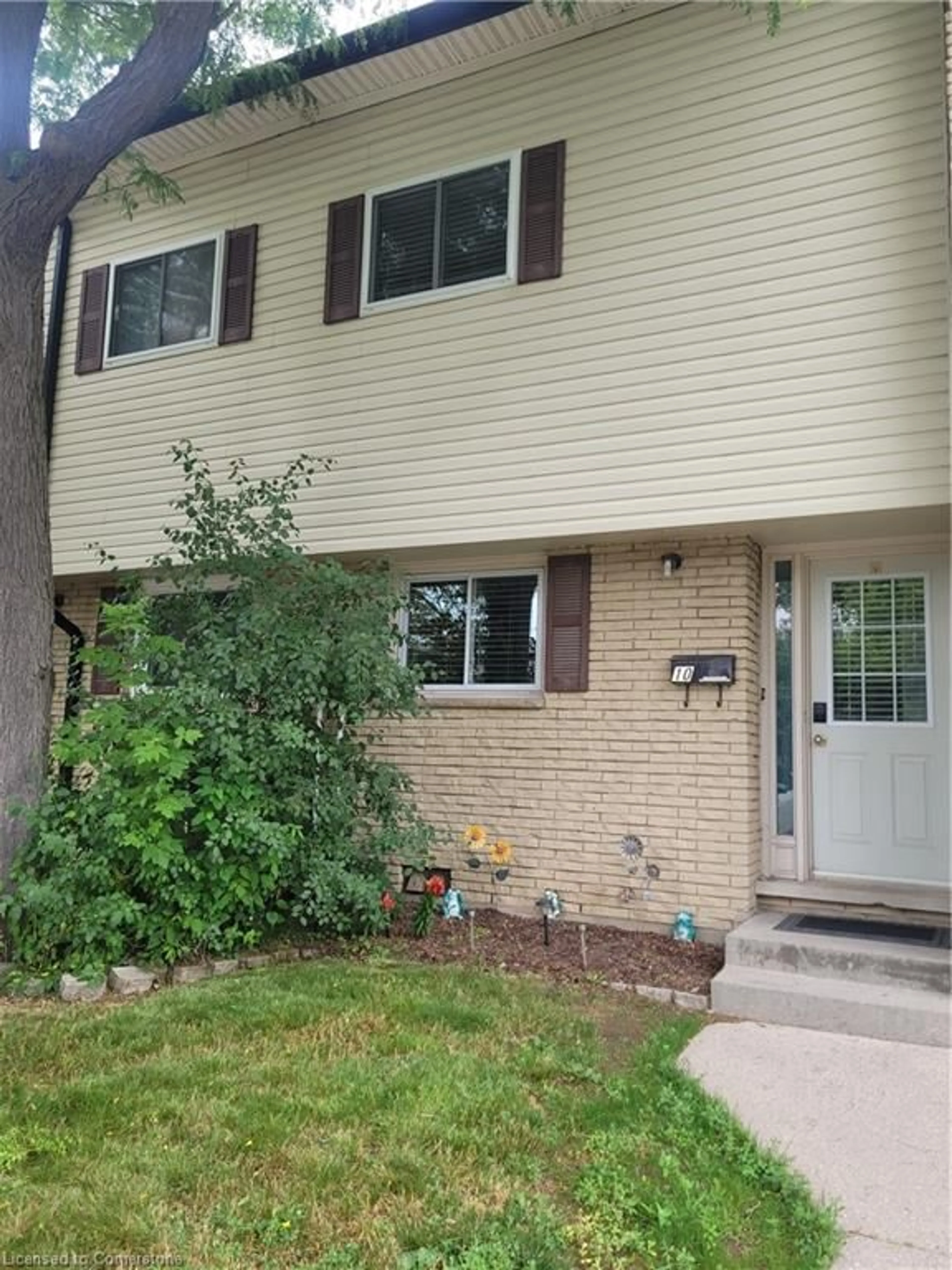 Home with vinyl exterior material, street for 211 Veronica Dr #10, Kitchener Ontario N2A 2R8