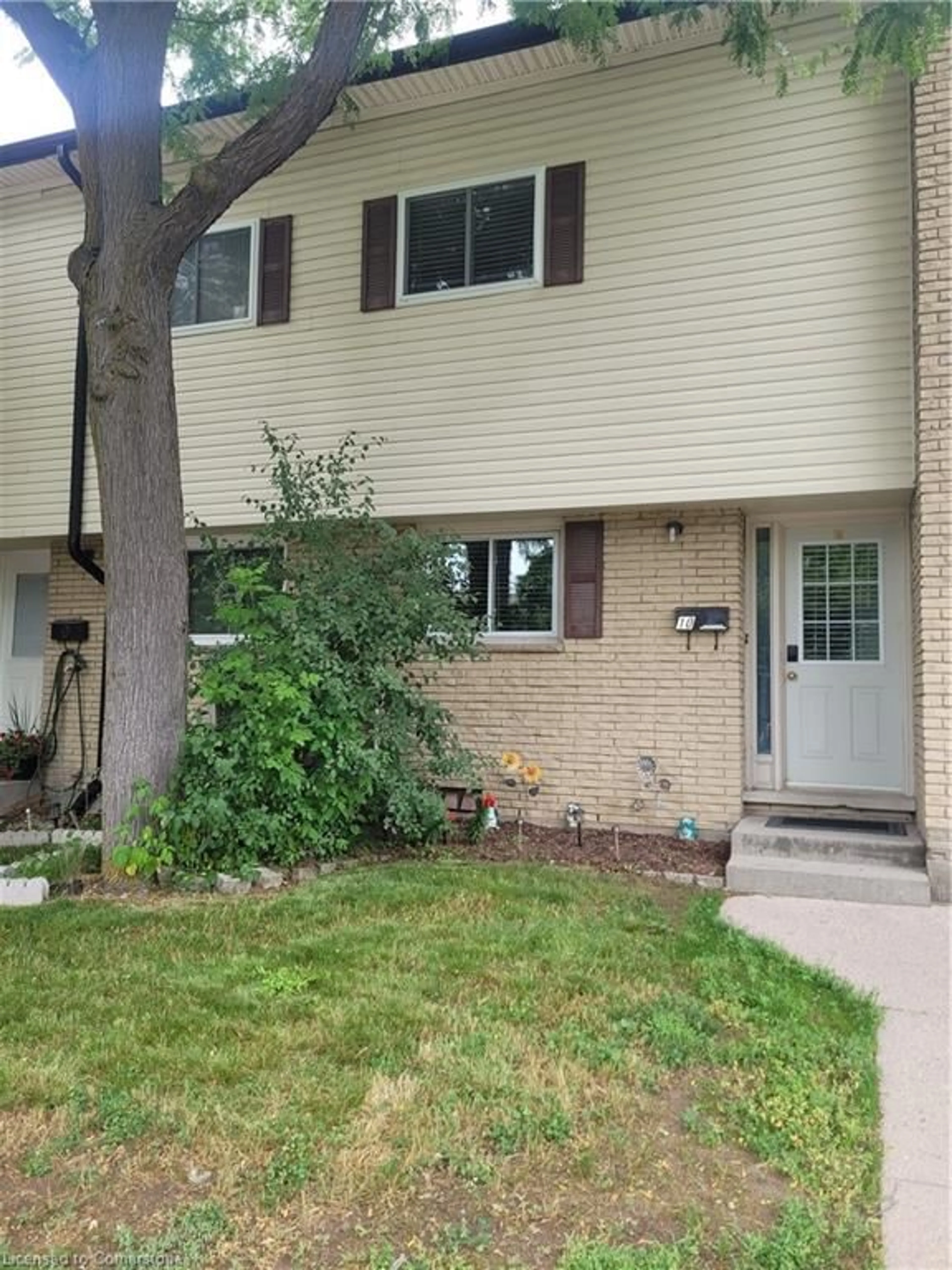 Home with vinyl exterior material, street for 211 Veronica Dr #10, Kitchener Ontario N2A 2R8