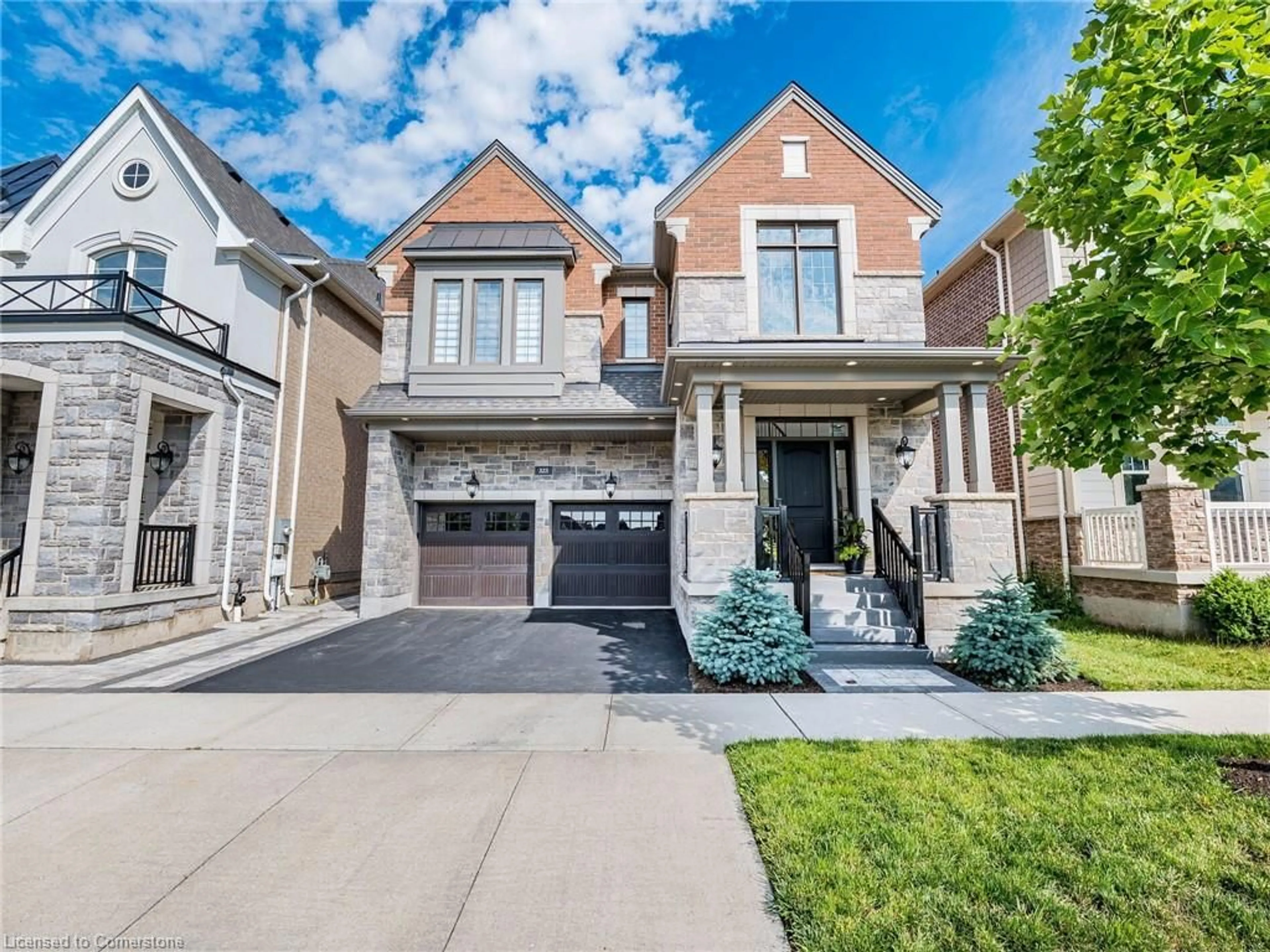 Home with brick exterior material, street for 323 Harold Dent Trail, Oakville Ontario L6M 1R3