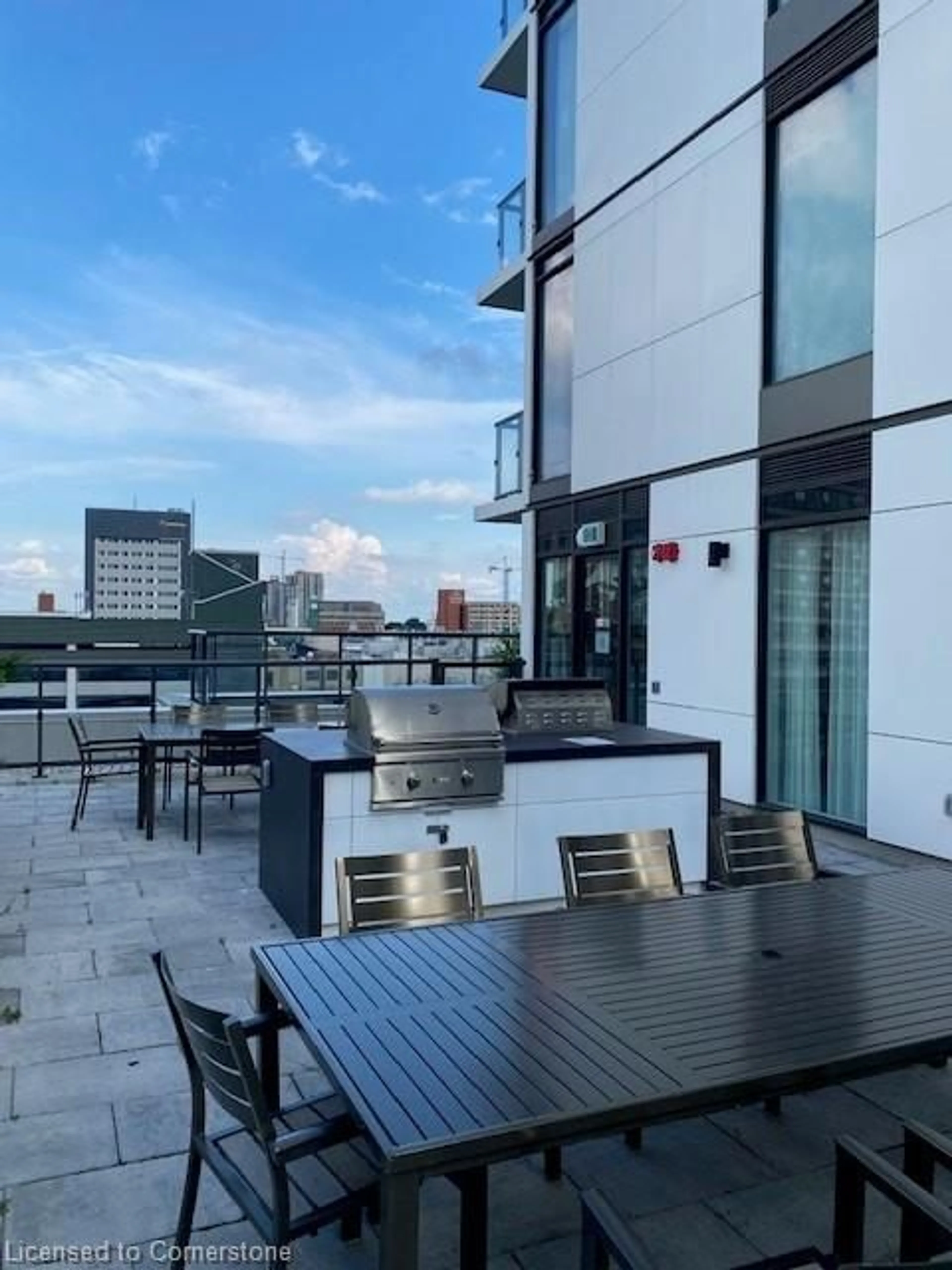 Patio, city buildings view from balcony for 55 Duke St #2106, Kitchener Ontario N2H 0C9
