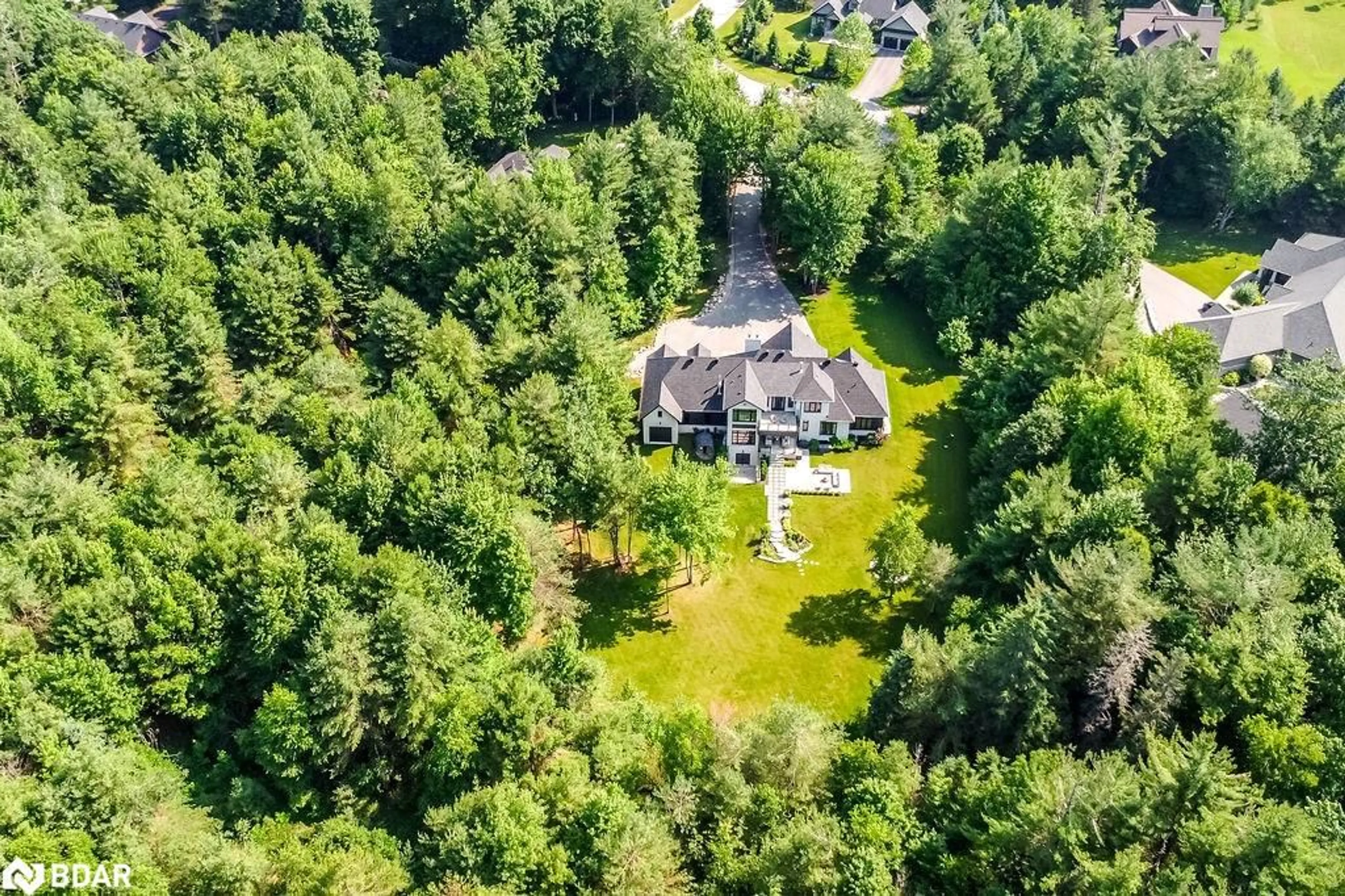 A pic from outside/outdoor area/front of a property/back of a property/a pic from drone, forest/trees view for 4 Sycamore Cir, Springwater Ontario L0L 2K0