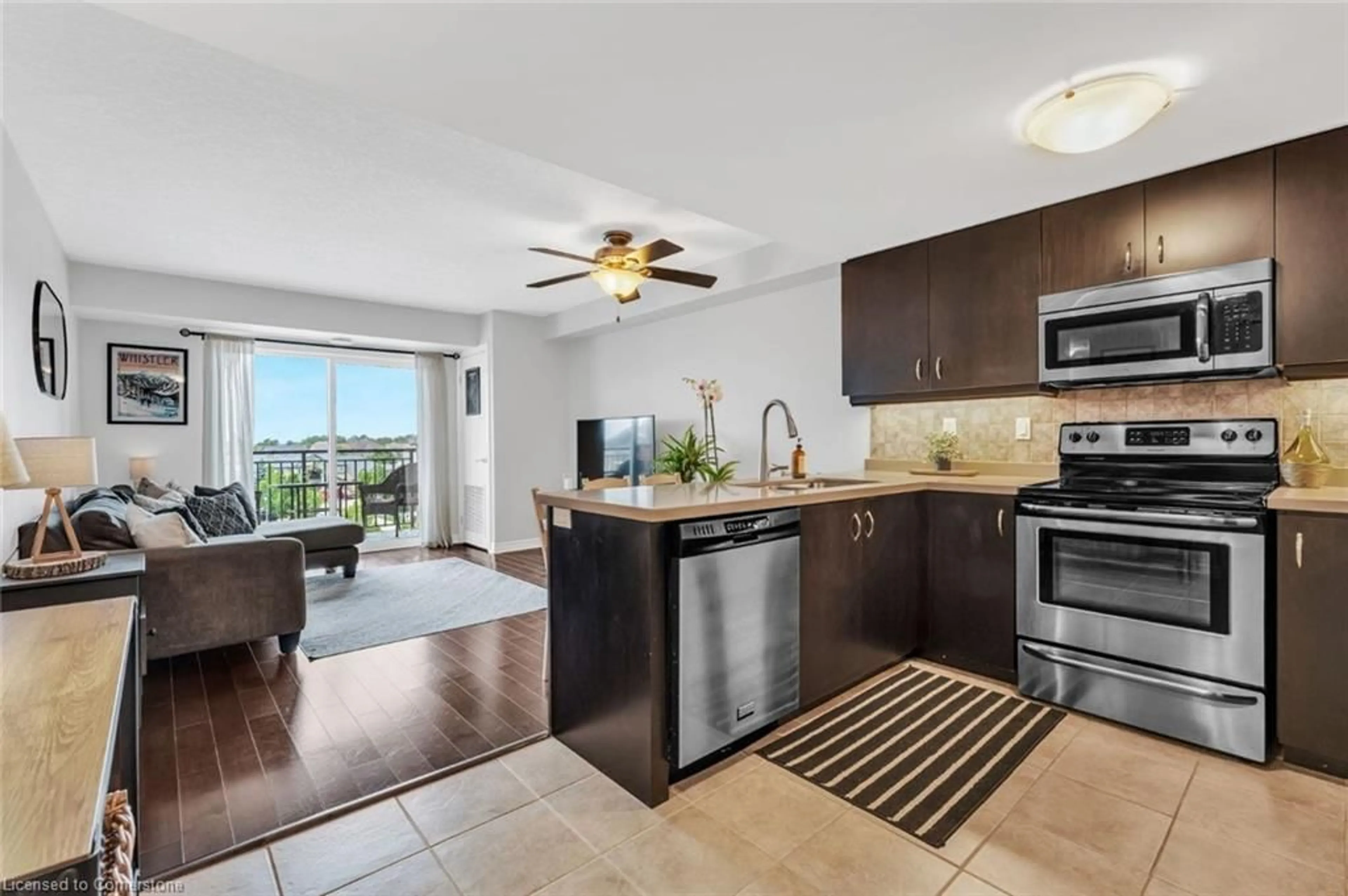Open concept kitchen, ceramic/tile floor for 60 Lynnmore St #414, Guelph Ontario N1L 0J8