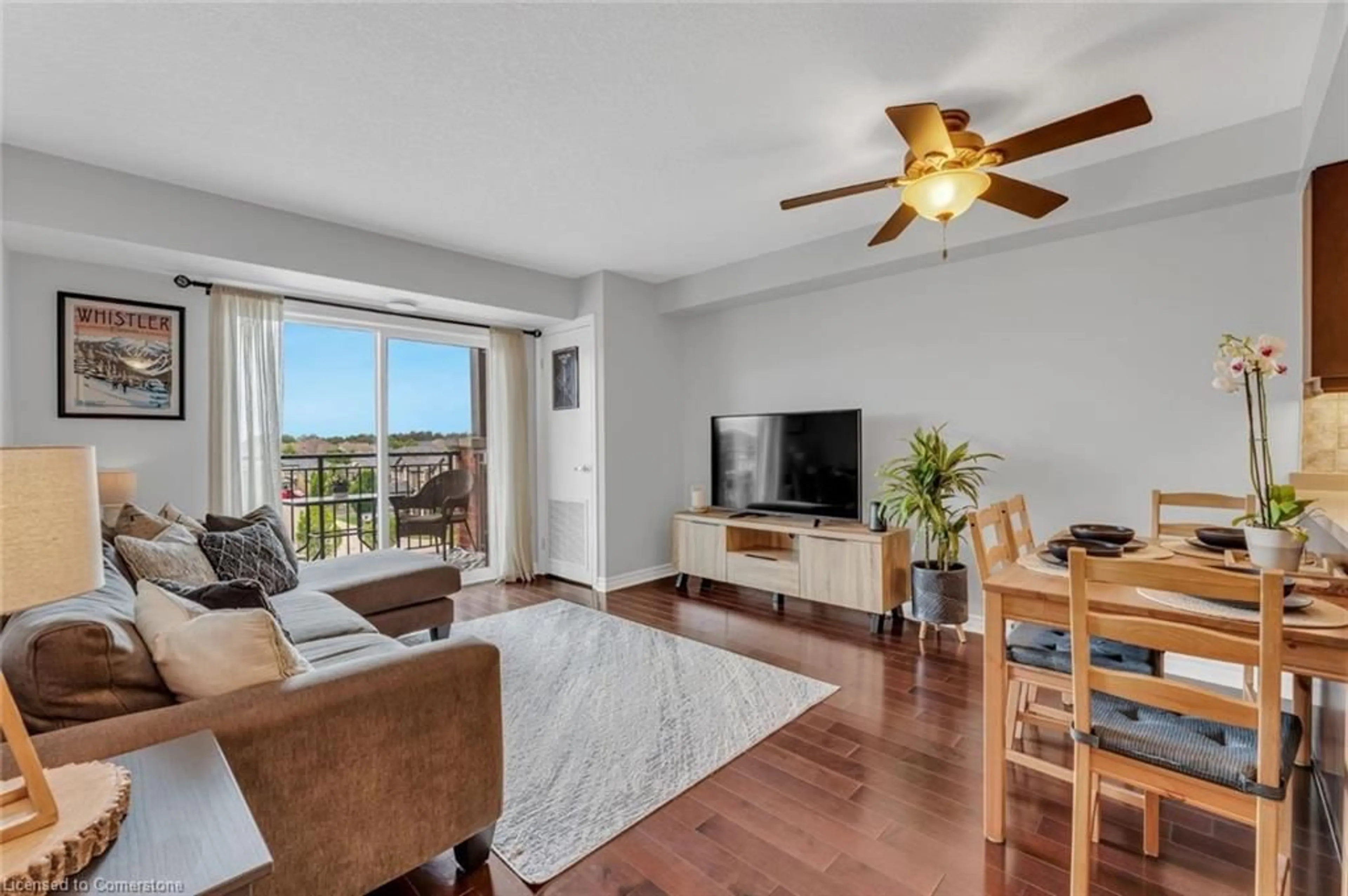 Living room with furniture, wood/laminate floor for 60 Lynnmore St #414, Guelph Ontario N1L 0J8