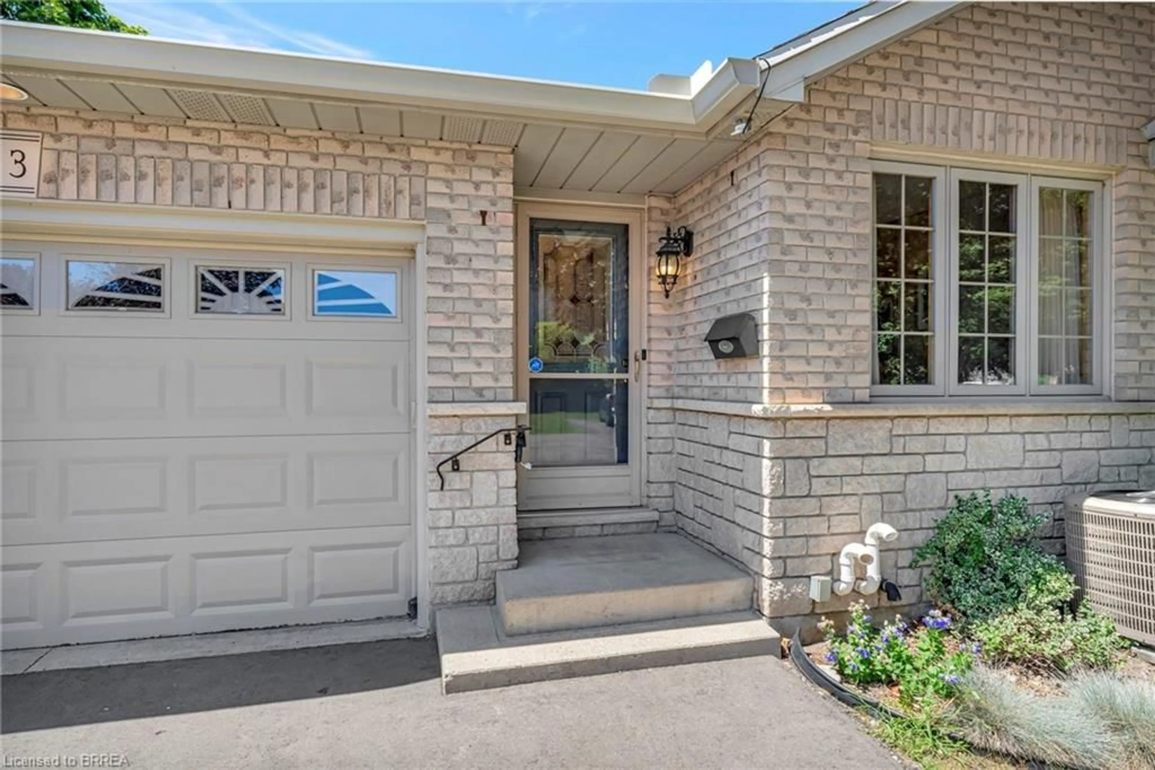 Home with brick exterior material, street for 24 Griffiths Dr #3, Paris Ontario N3L 4C5