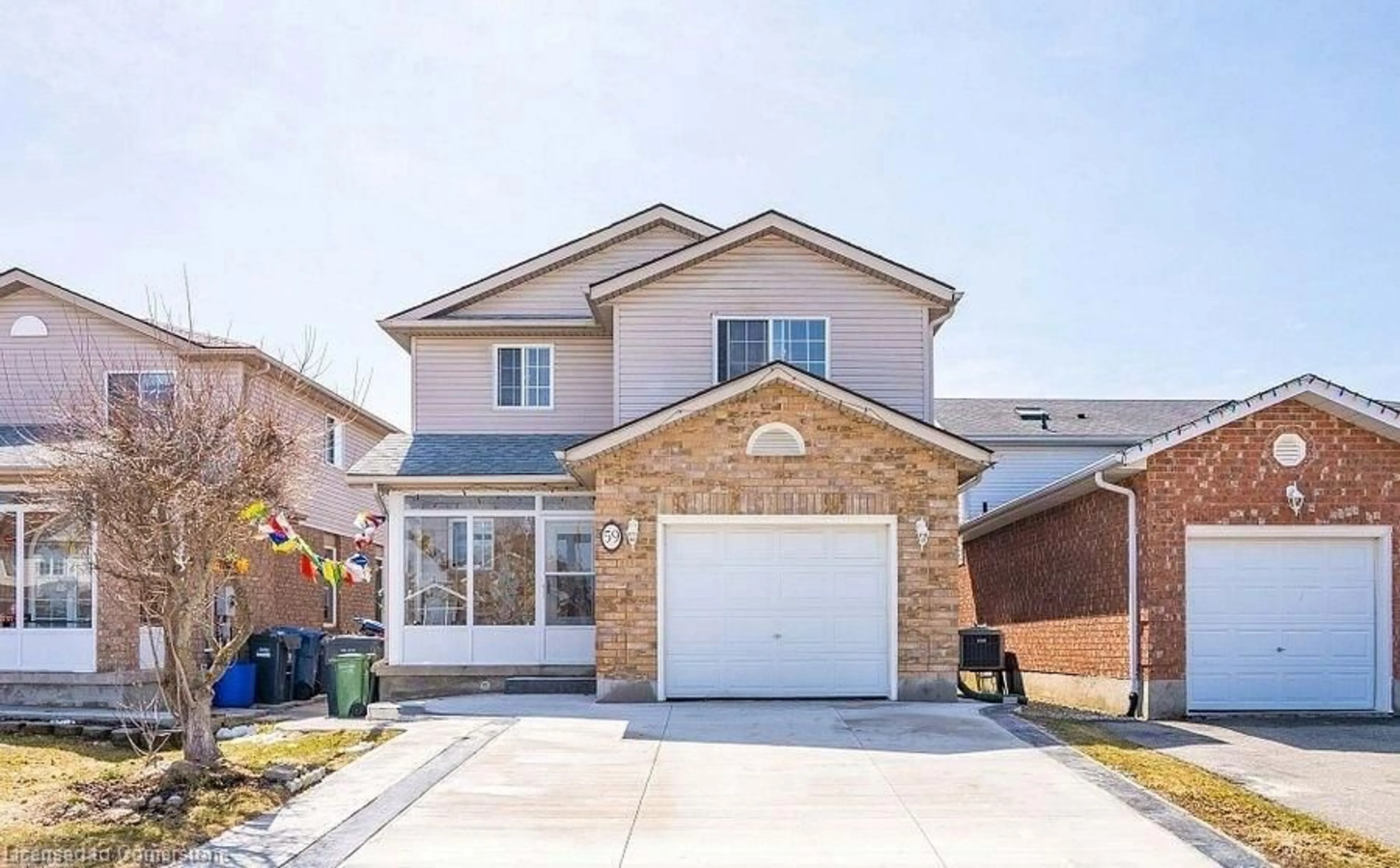 Home with brick exterior material, street for 59 Deerpath Dr, Guelph Ontario N1K 1V1