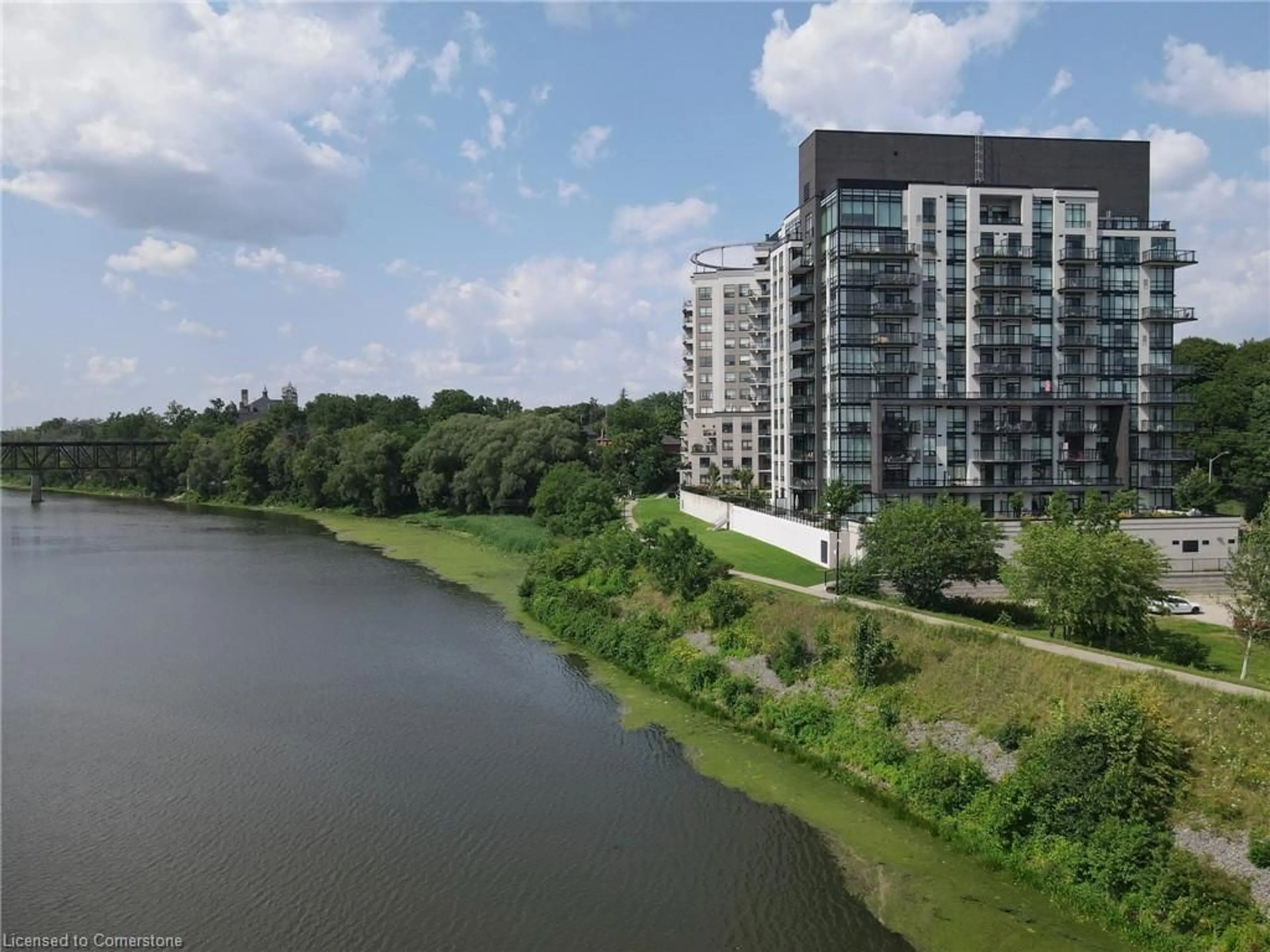 A pic from outside/outdoor area/front of a property/back of a property/a pic from drone, water/lake/river/ocean view for 150 Water Street North St #507, Cambridge Ontario N1R 0B5