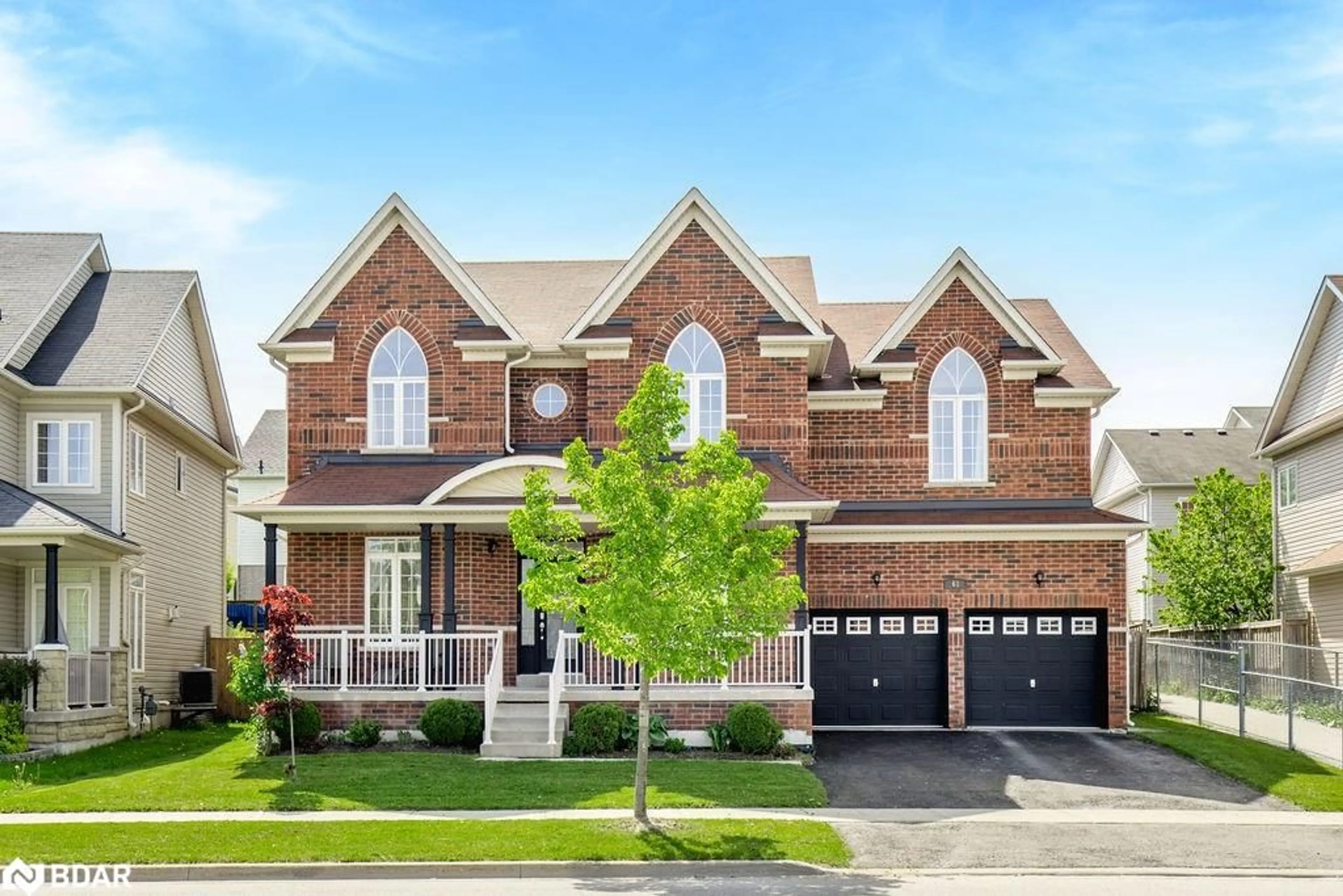 Home with brick exterior material, street for 61 The Queensway, Barrie Ontario L4M 7J3