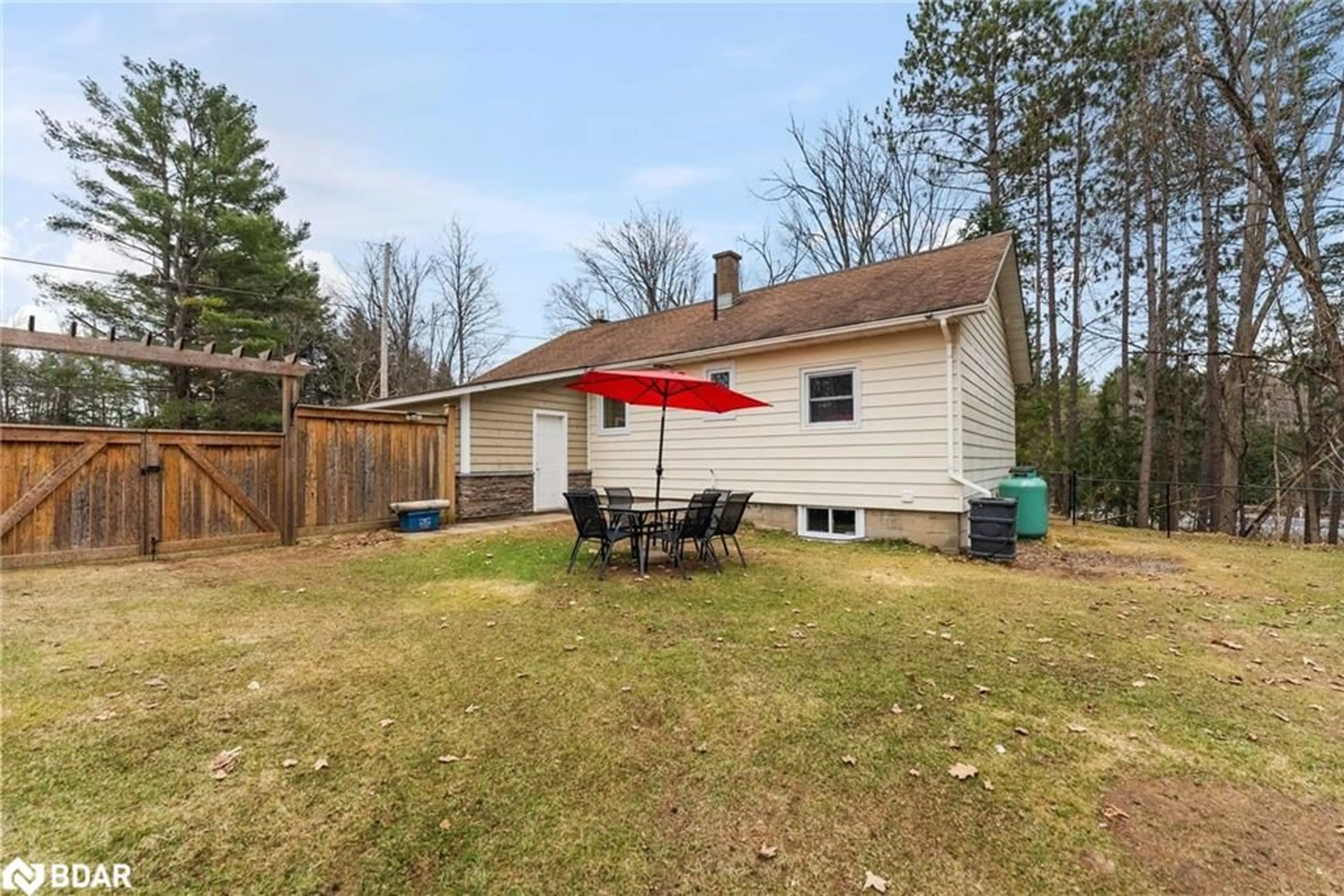 A pic from outside/outdoor area/front of a property/back of a property/a pic from drone, unknown for 58 River St, Apsley Ontario K0L 1A0