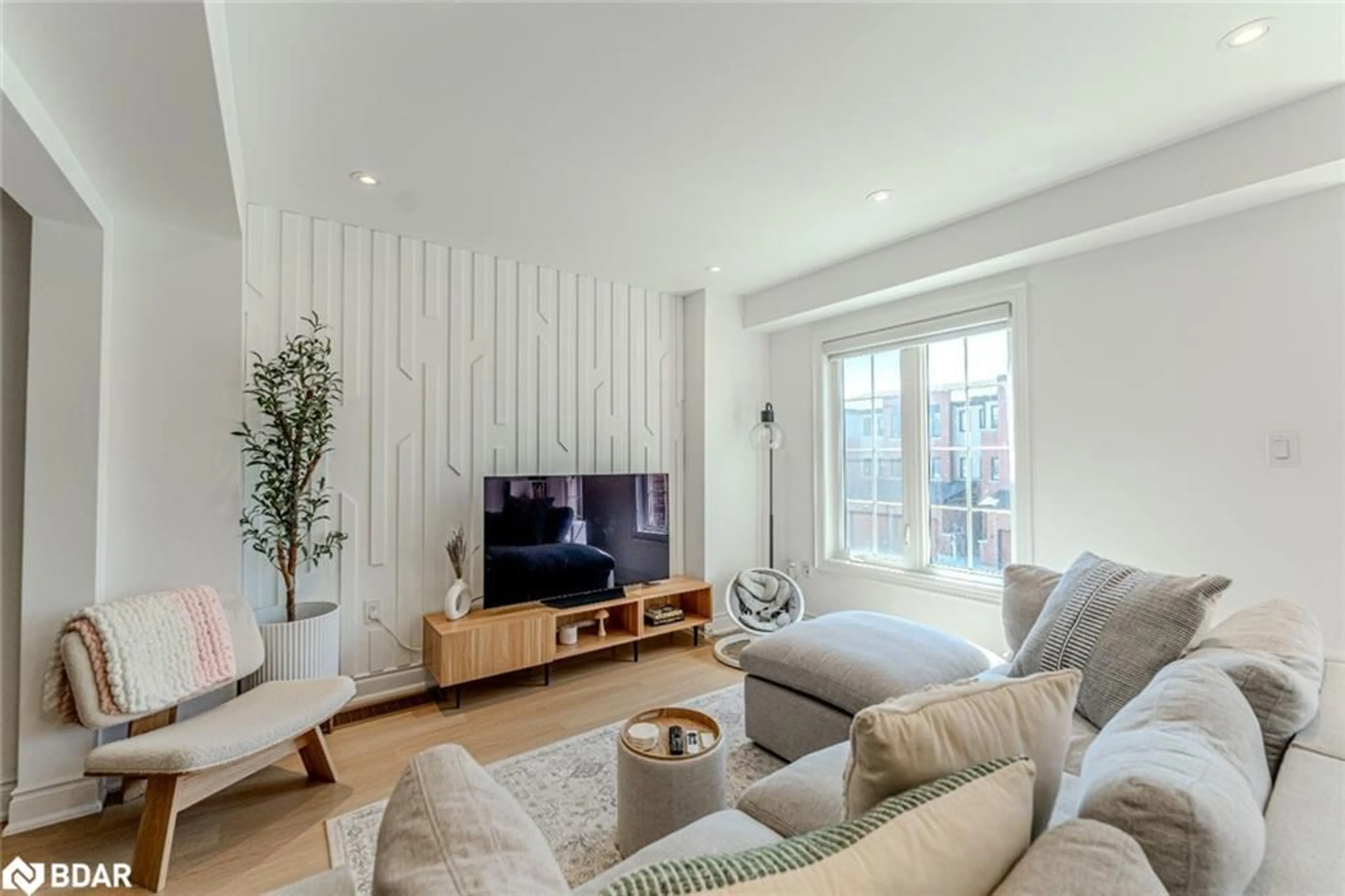 Living room with furniture, unknown for 48 Hay Lane, Barrie Ontario L9J 0T8