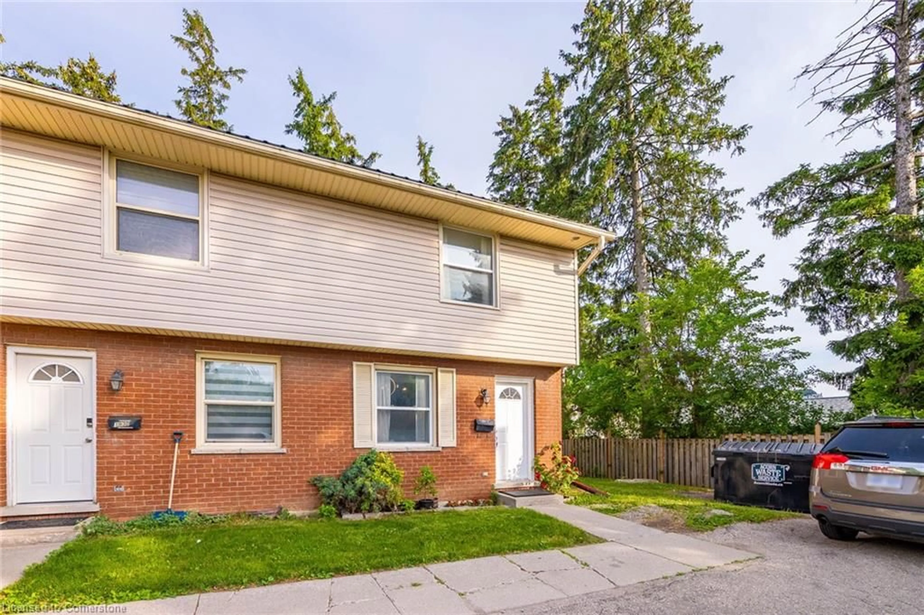 Home with brick exterior material, street for 193 Thaler Ave #E, Kitchener Ontario N2A 1R4