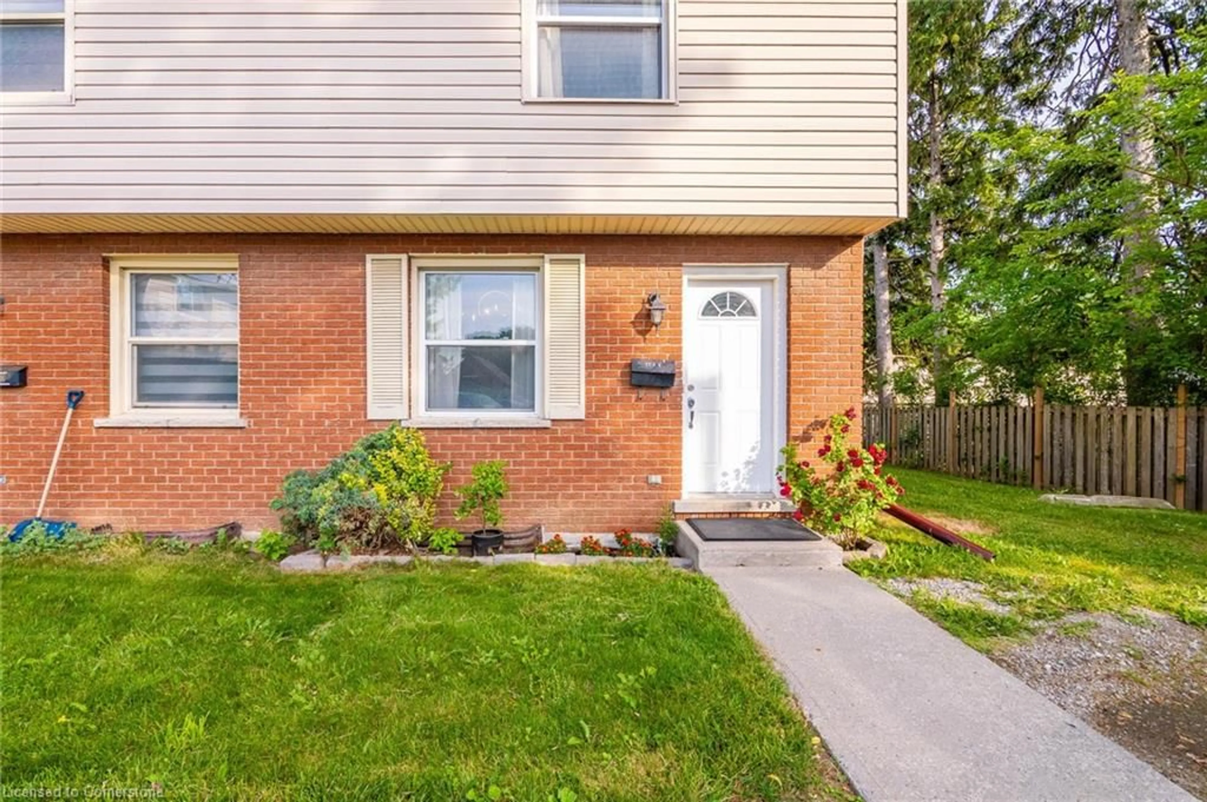 Home with brick exterior material, street for 193 Thaler Ave #E, Kitchener Ontario N2A 1R4