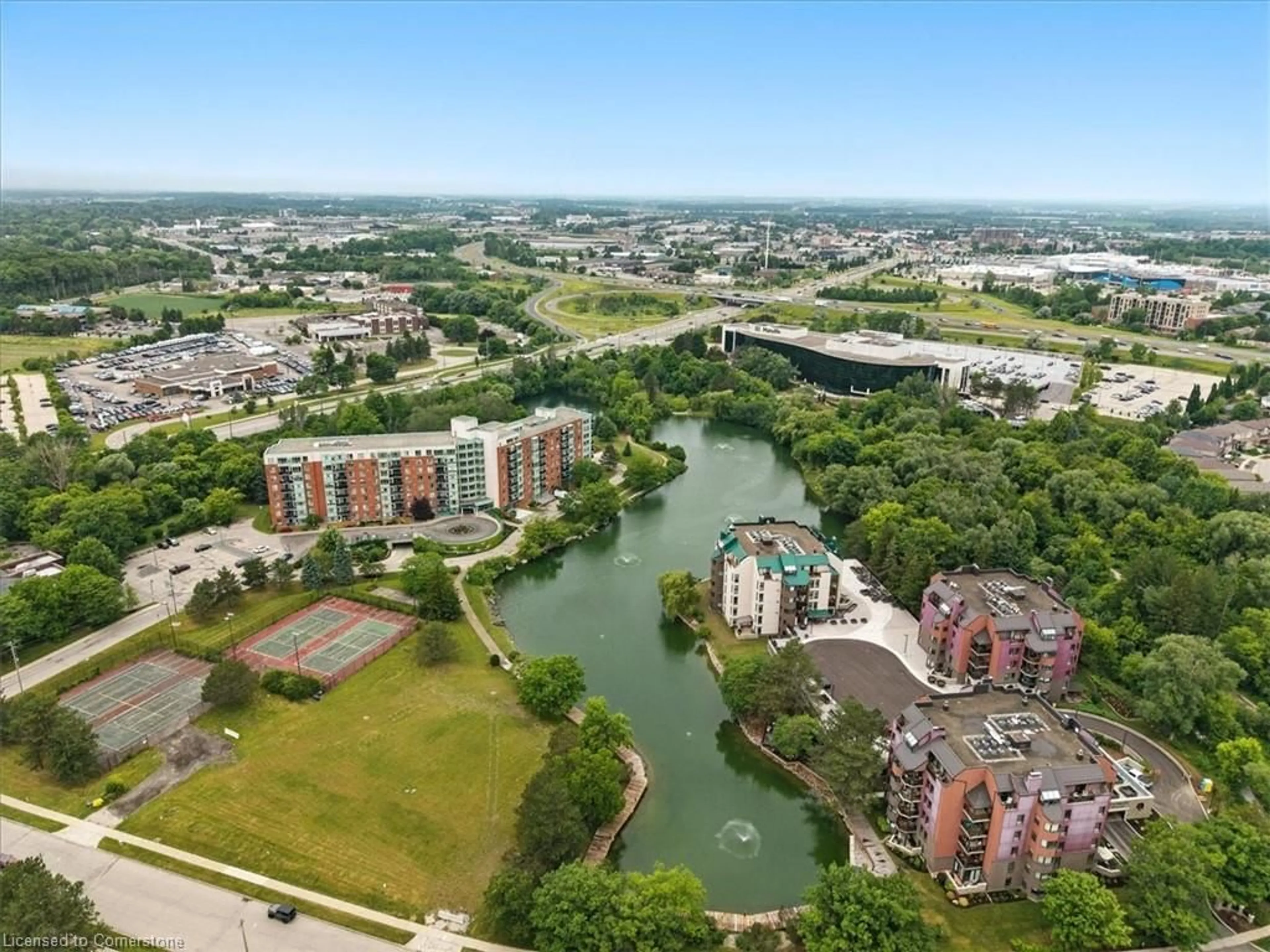 A pic from outside/outdoor area/front of a property/back of a property/a pic from drone, water/lake/river/ocean view for 30 Blue Springs Dr #201, Waterloo Ontario N2J 4T2