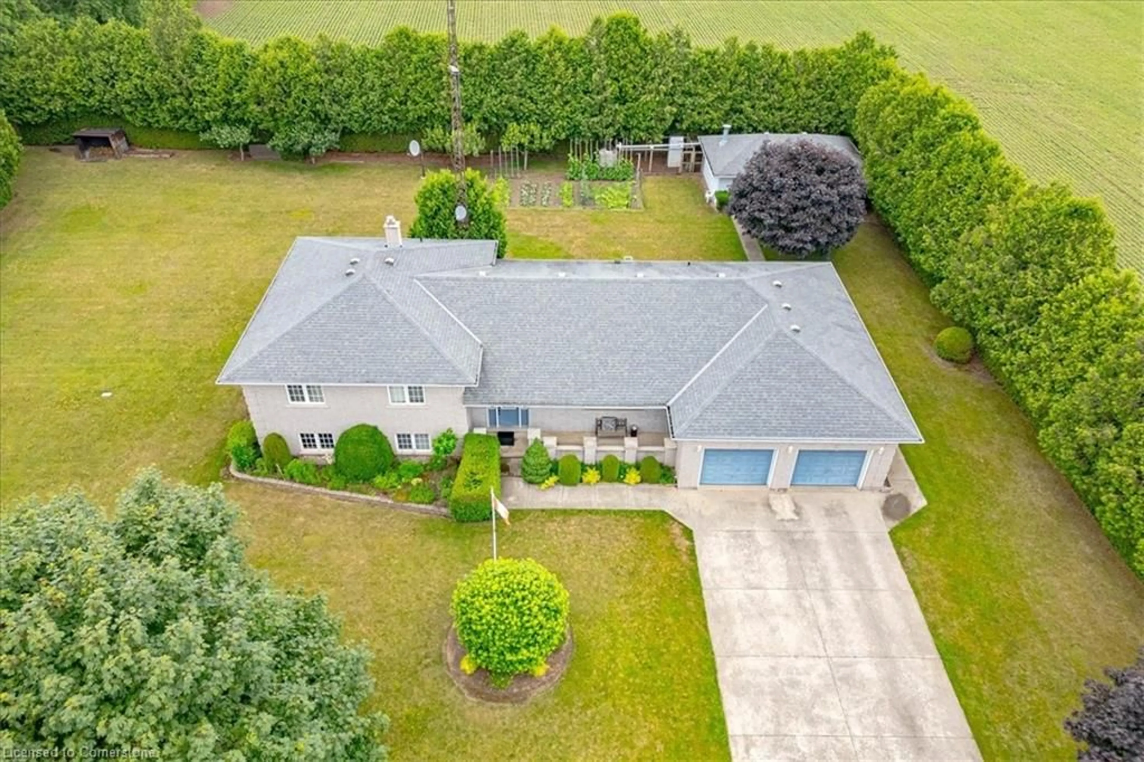 A pic from outside/outdoor area/front of a property/back of a property/a pic from drone, unknown for 359 Windham Road 13 Rd, Delhi Ontario N4B 2W5