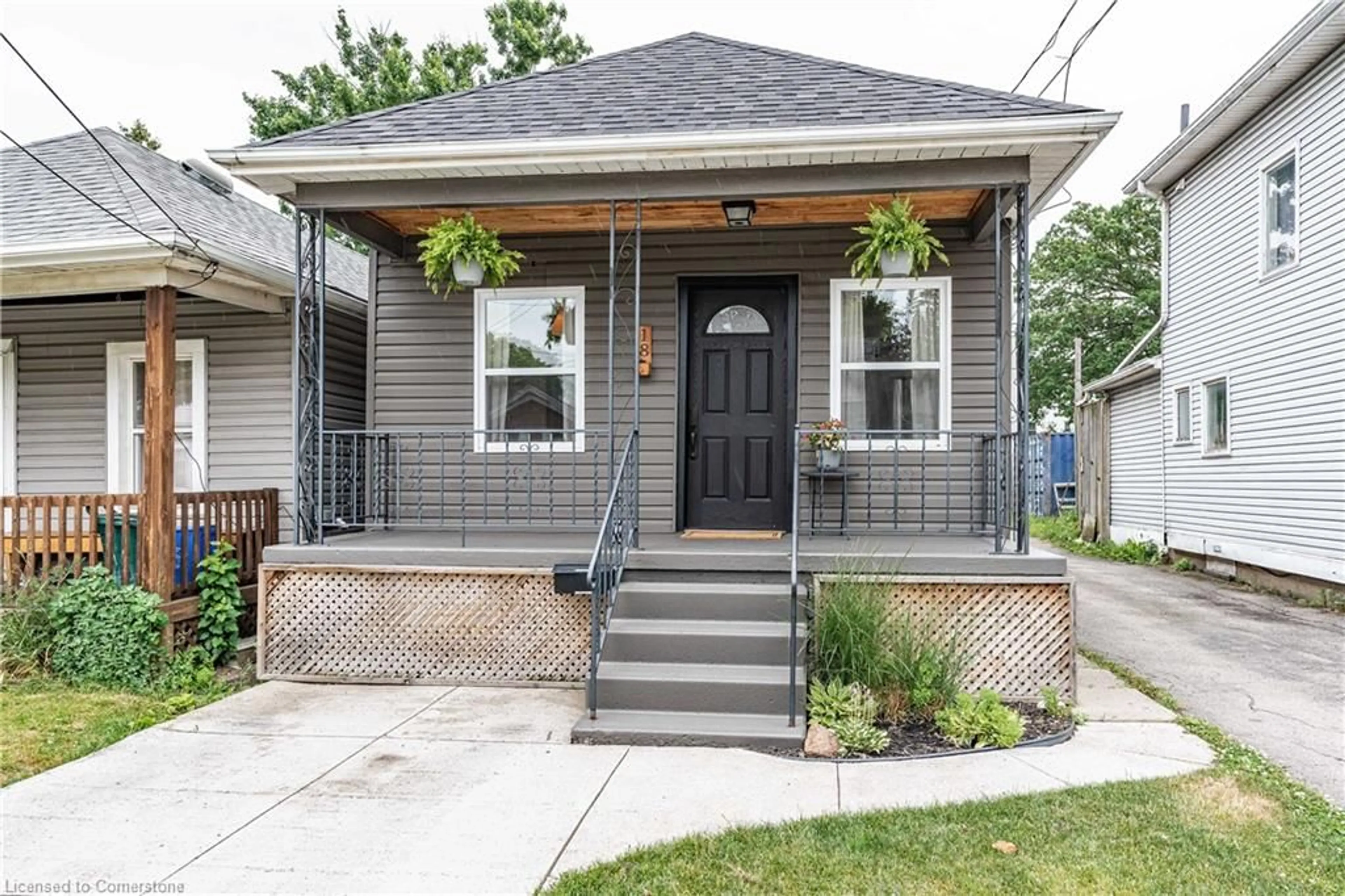 Home with brick exterior material, street for 18 Ellis Ave, Hamilton Ontario L8H 4L7