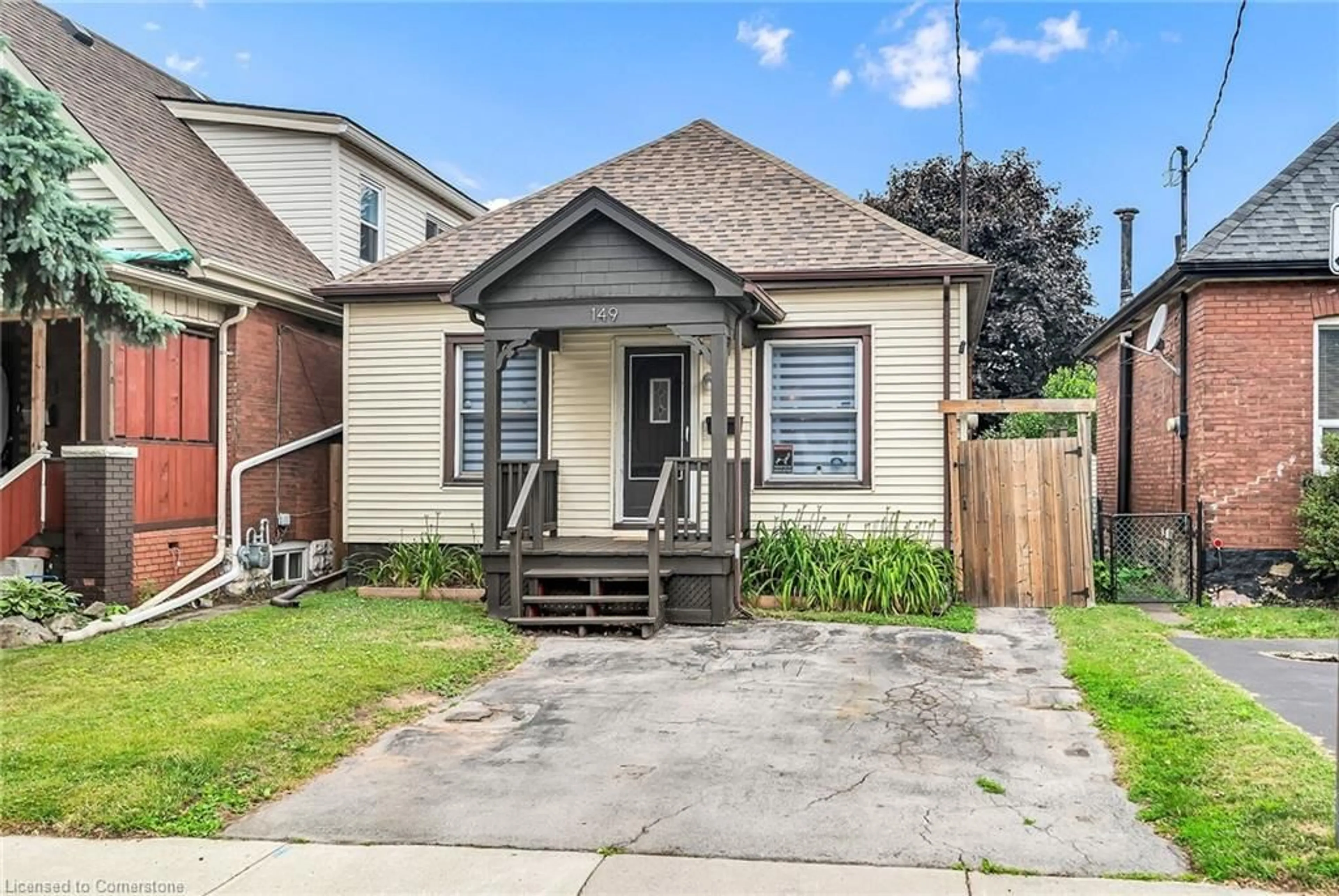 Home with brick exterior material, street for 149 Kensington Ave, Hamilton Ontario L8L 7N4