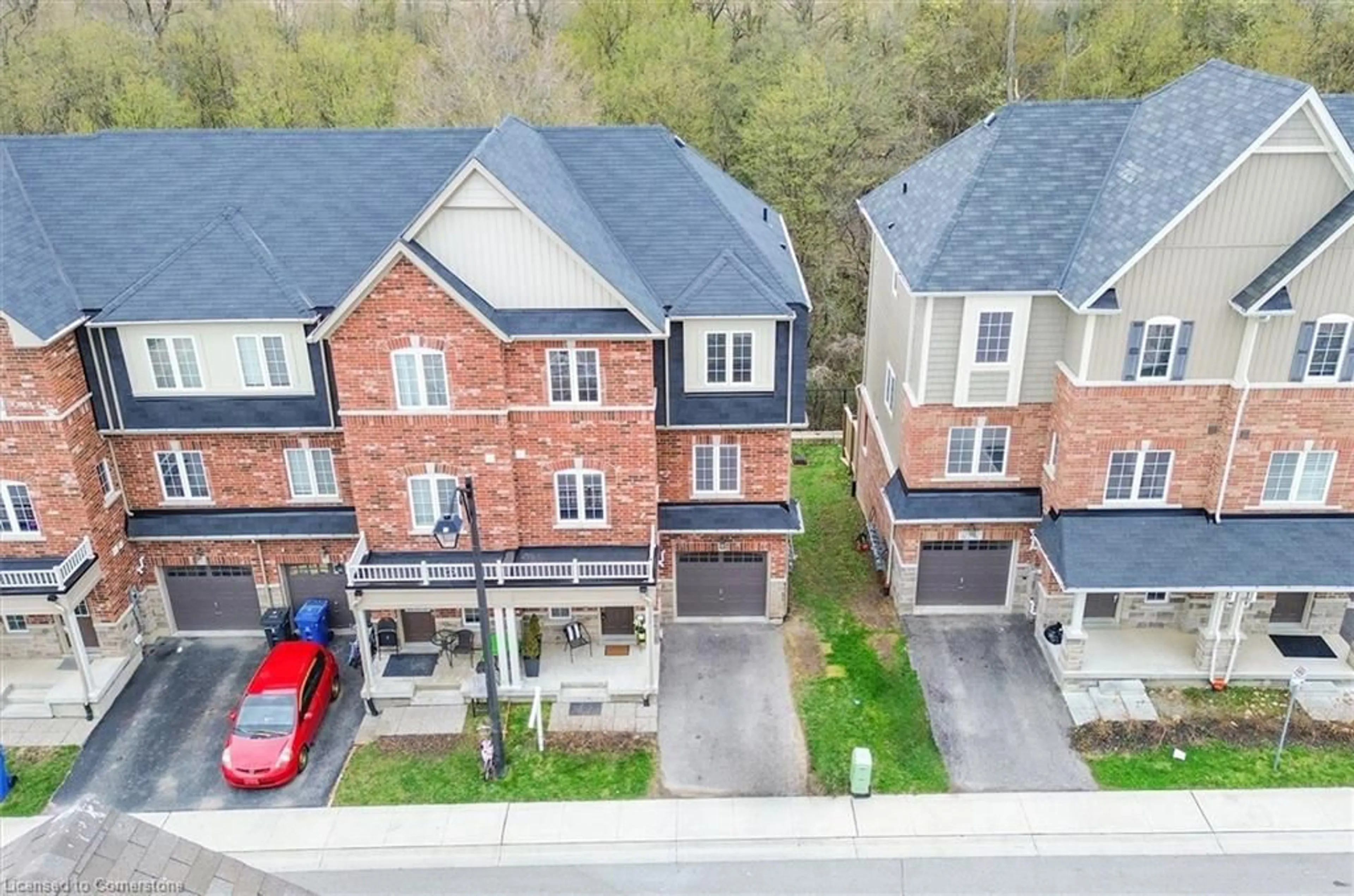 A pic from outside/outdoor area/front of a property/back of a property/a pic from drone, street for 88 Decorso Dr #51, Guelph Ontario N1L 0A9