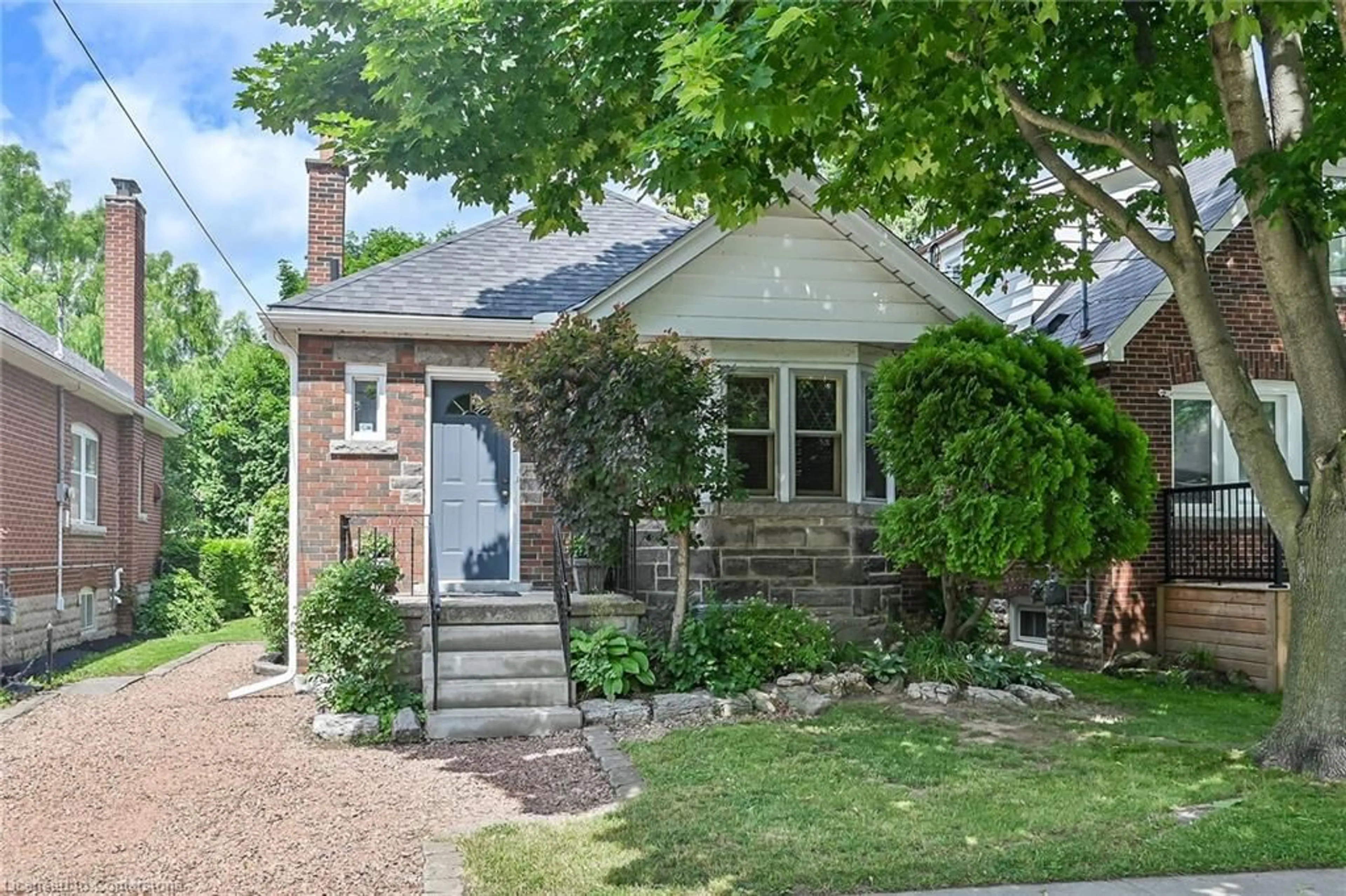Home with brick exterior material, street for 57 Bond St, Hamilton Ontario L8S 3W3