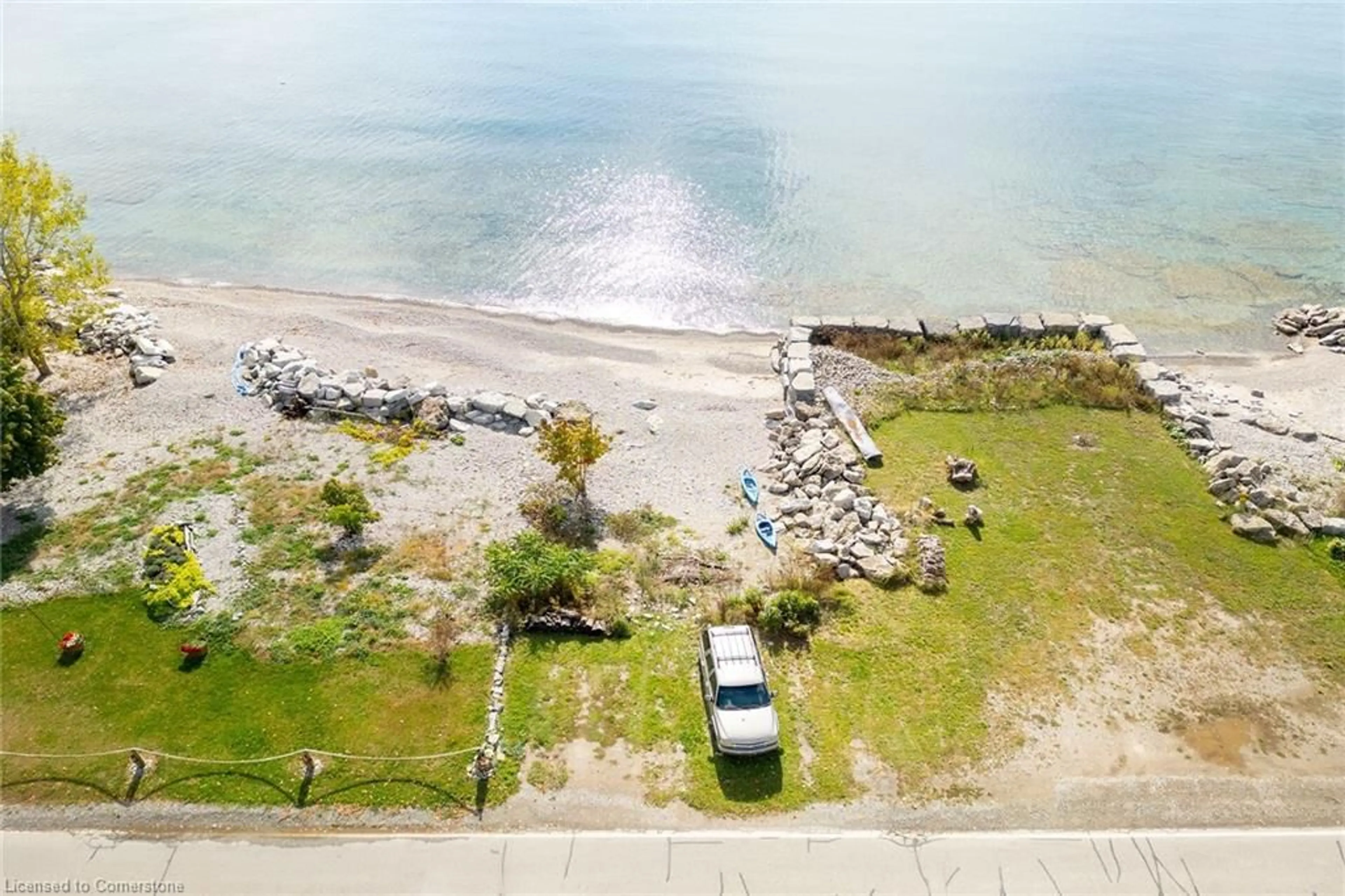 A pic from outside/outdoor area/front of a property/back of a property/a pic from drone, water/lake/river/ocean view for 2689 North Shore Blvd, Dunnville Ontario N0A 1K0