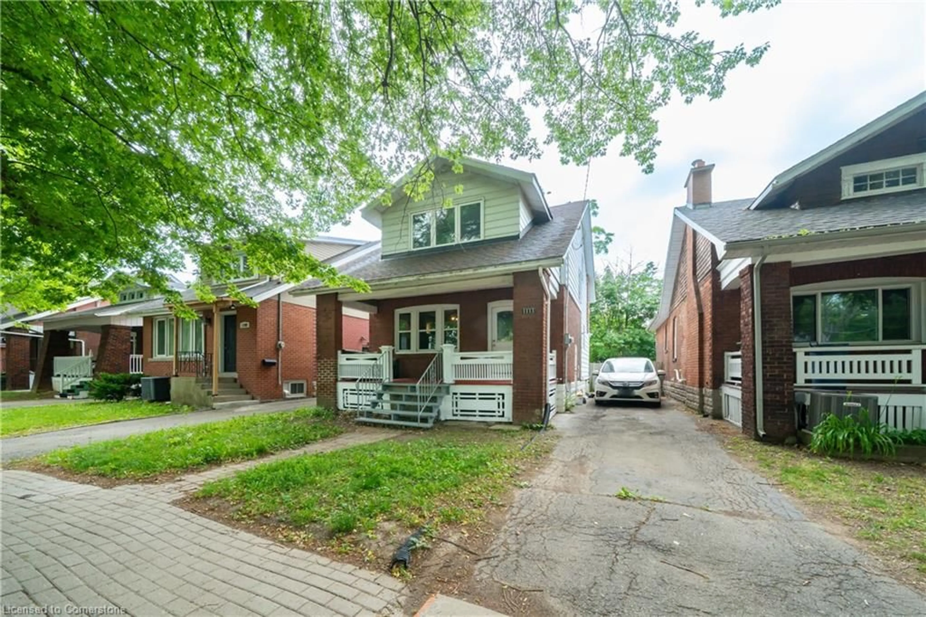 Home with brick exterior material, street for 1111 King St, Hamilton Ontario L8S 1L8