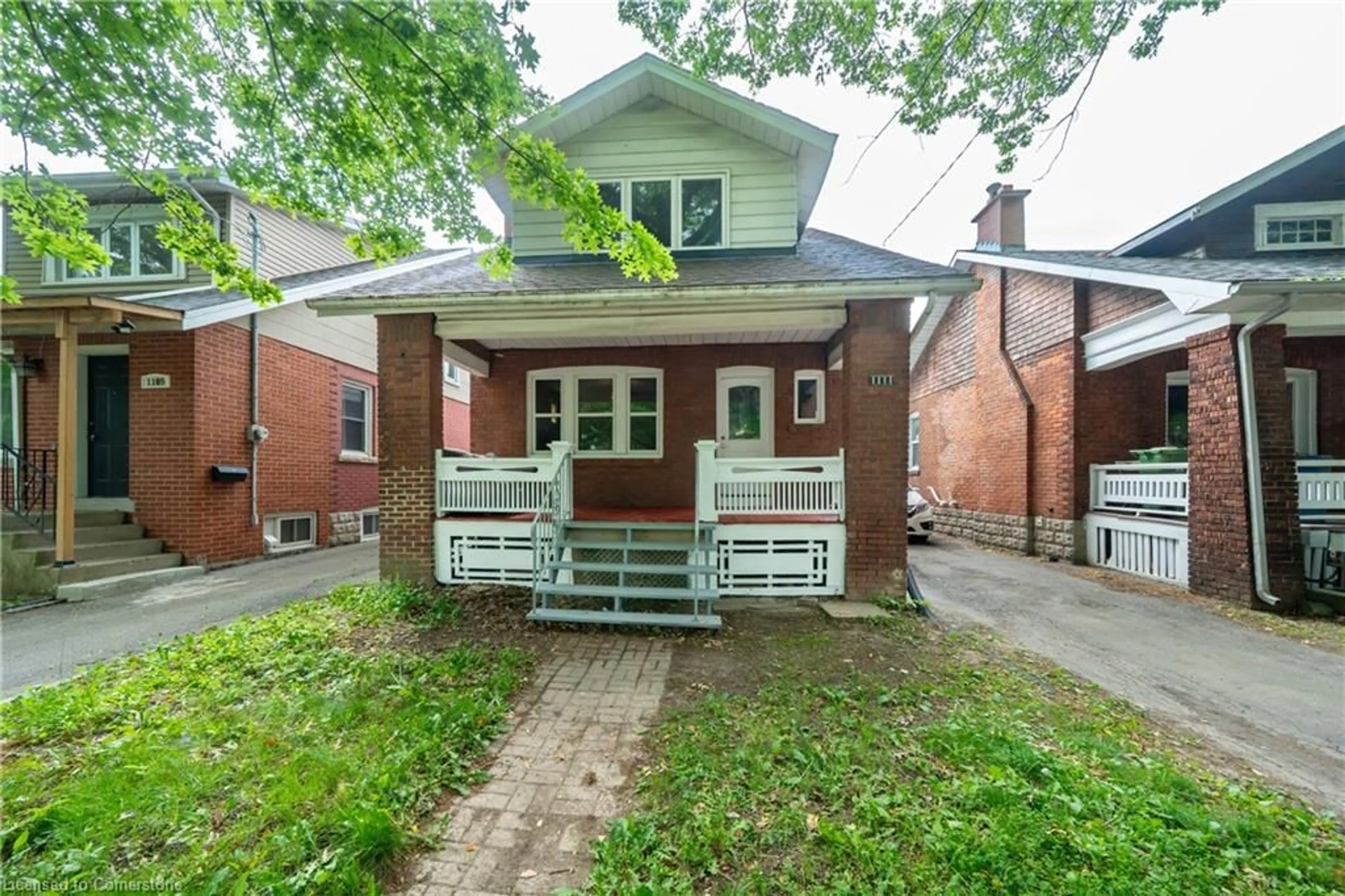 Home with brick exterior material, street for 1111 King St, Hamilton Ontario L8S 1L8