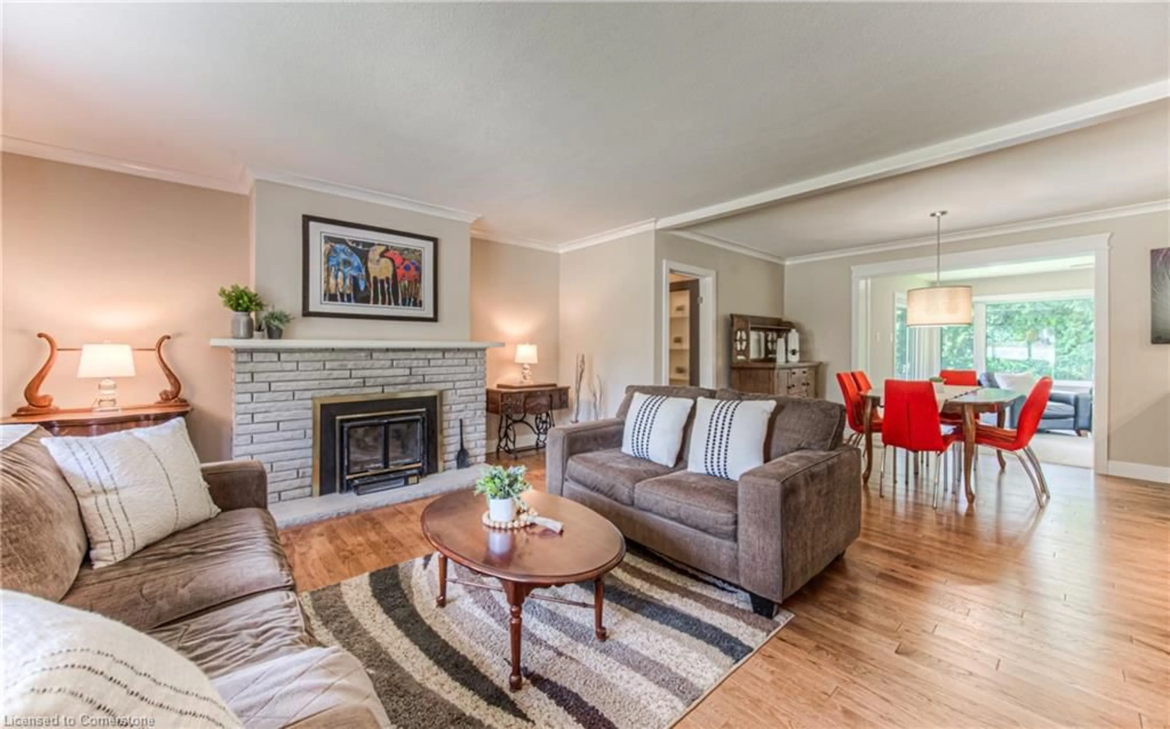 Living room with furniture, wood/laminate floor for 73 Gatewood Rd, Kitchener Ontario N2M 4E3