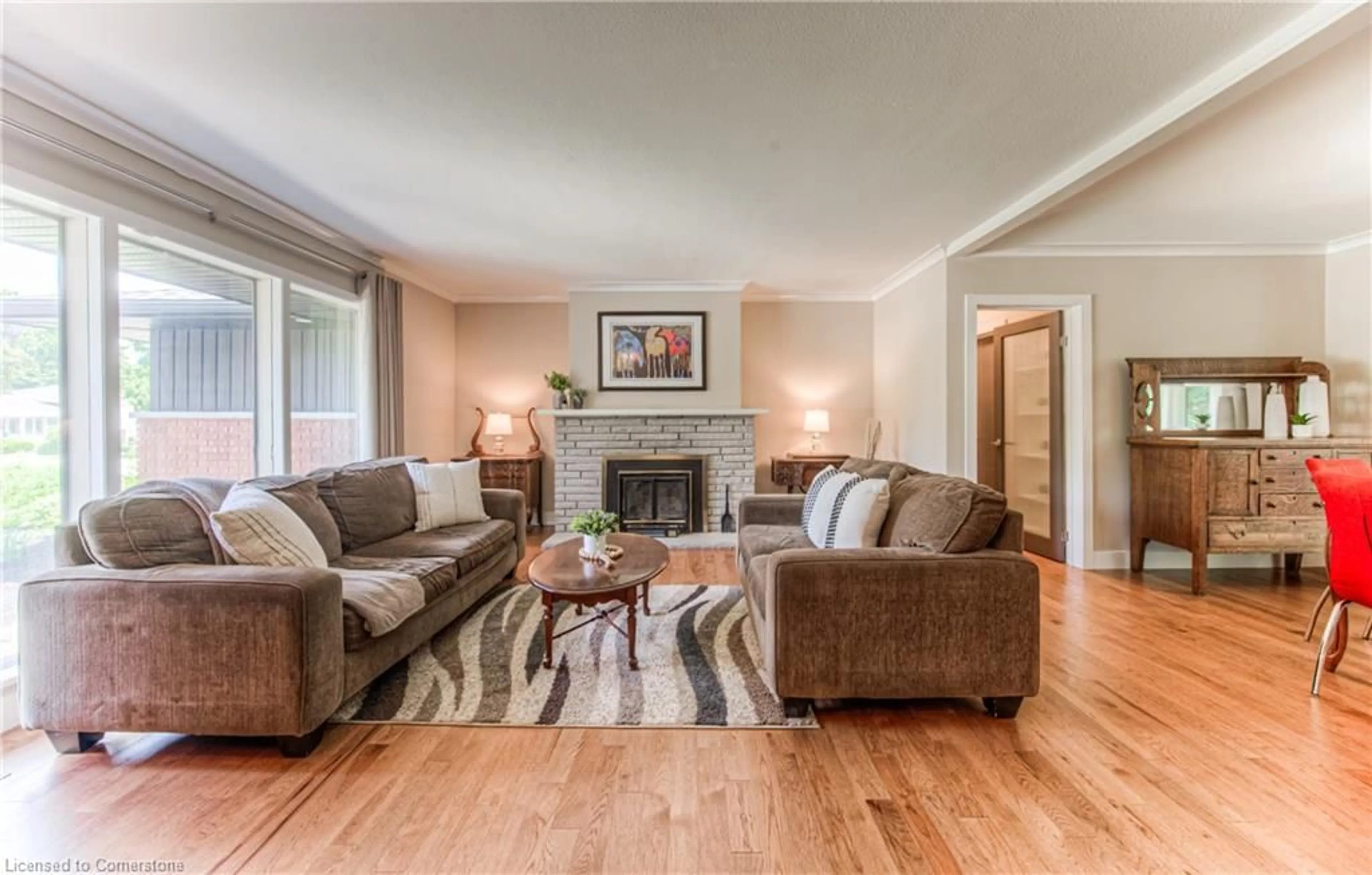 Living room with furniture, wood/laminate floor for 73 Gatewood Rd, Kitchener Ontario N2M 4E3