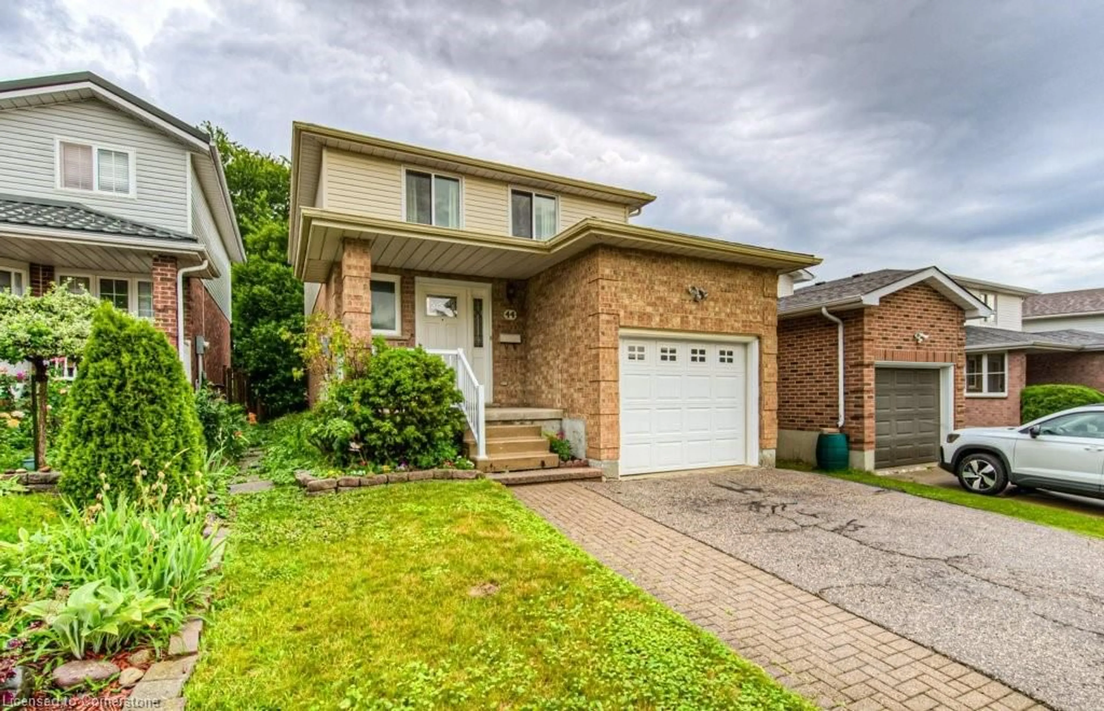 Home with brick exterior material, street for 44 Northmanor Cres, Kitchener Ontario N2N 3C2