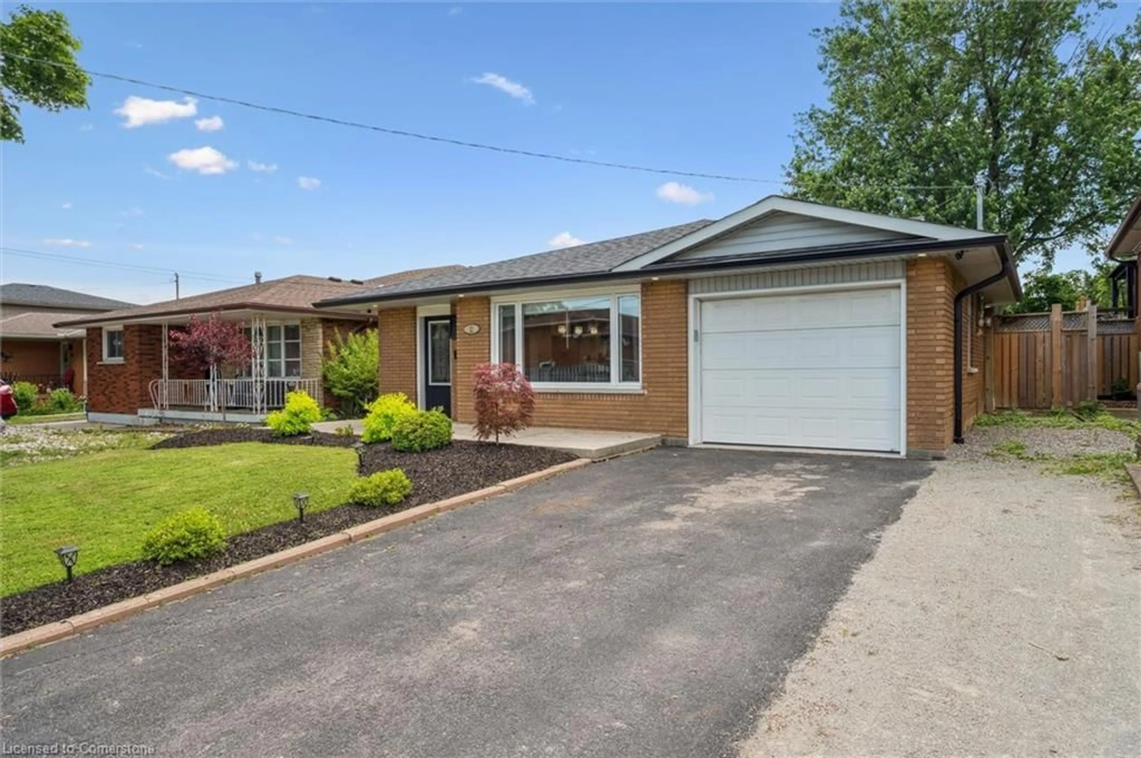 Home with brick exterior material, street for 12 Anson Ave, Hamilton Ontario L8T 2X3