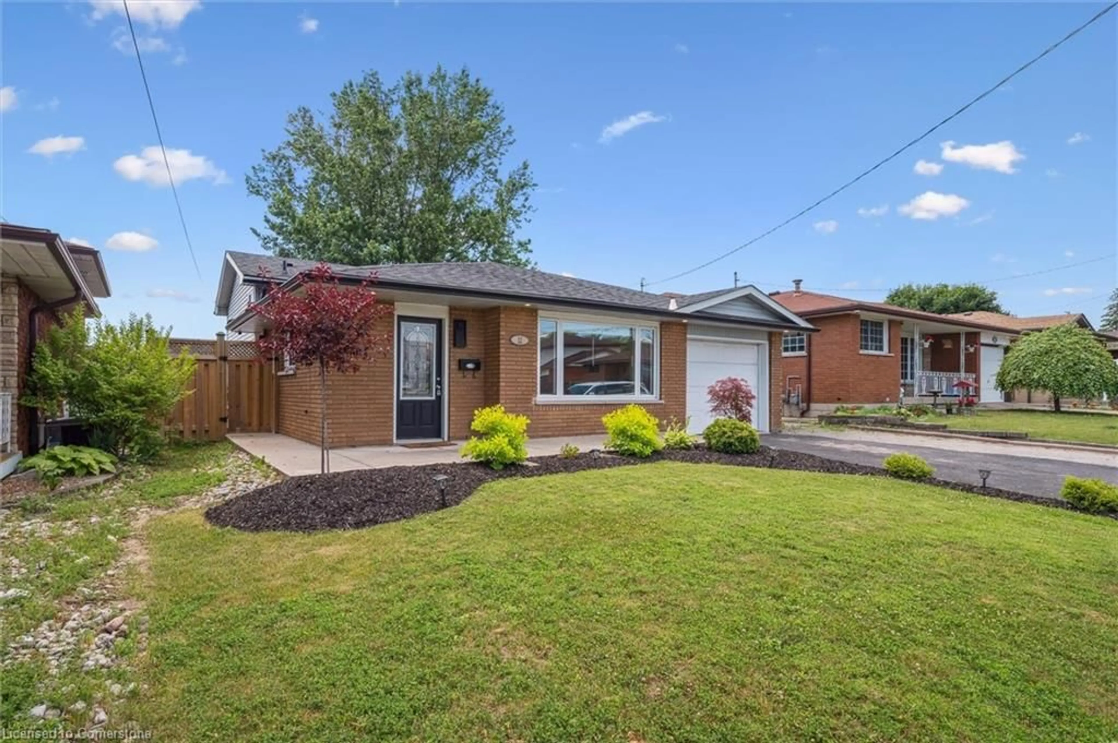 Home with brick exterior material, street for 12 Anson Ave, Hamilton Ontario L8T 2X3
