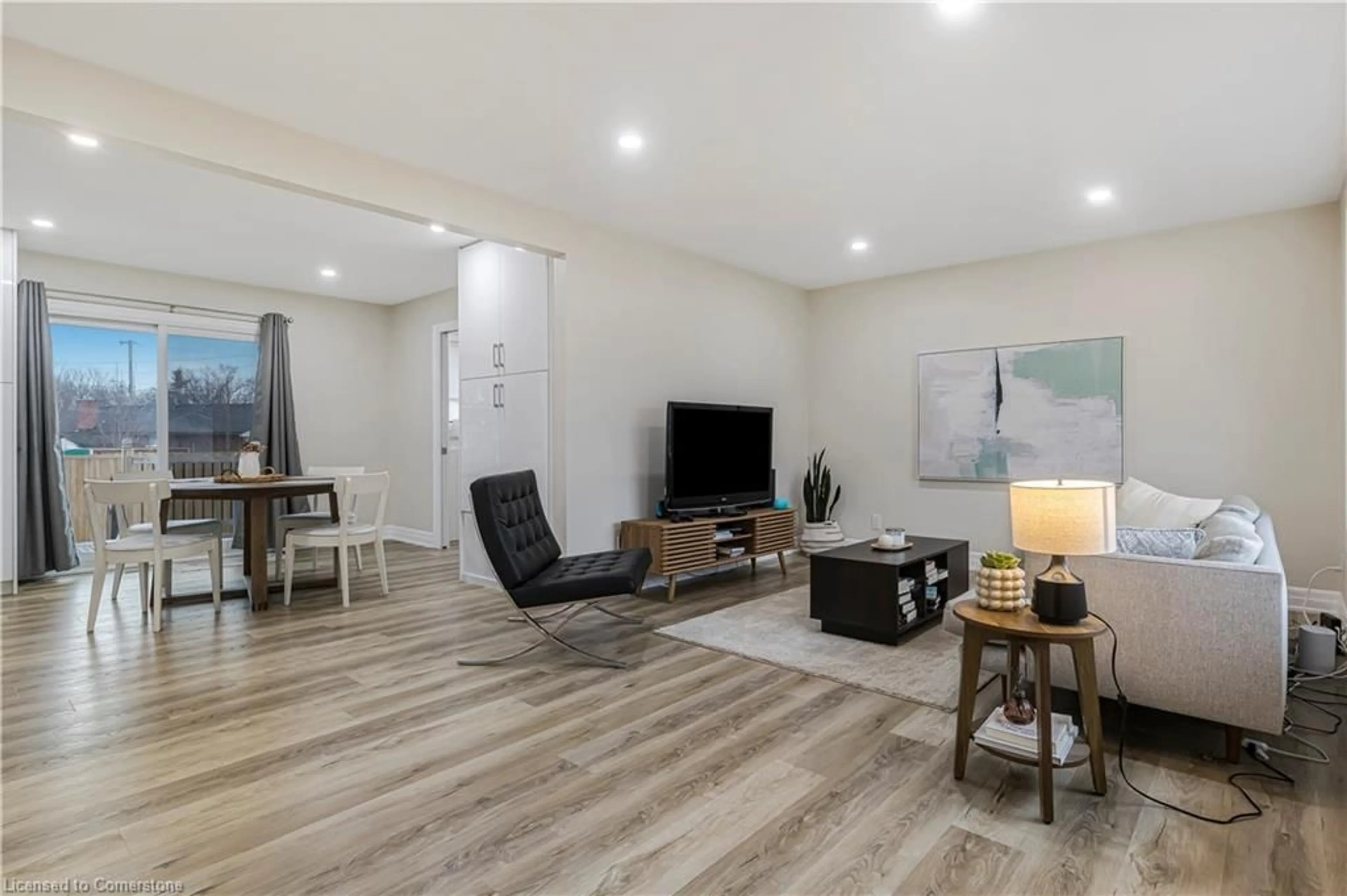 Living room with furniture, wood/laminate floor for 37 Coronation Blvd, St. Catharines Ontario L2S 2V2